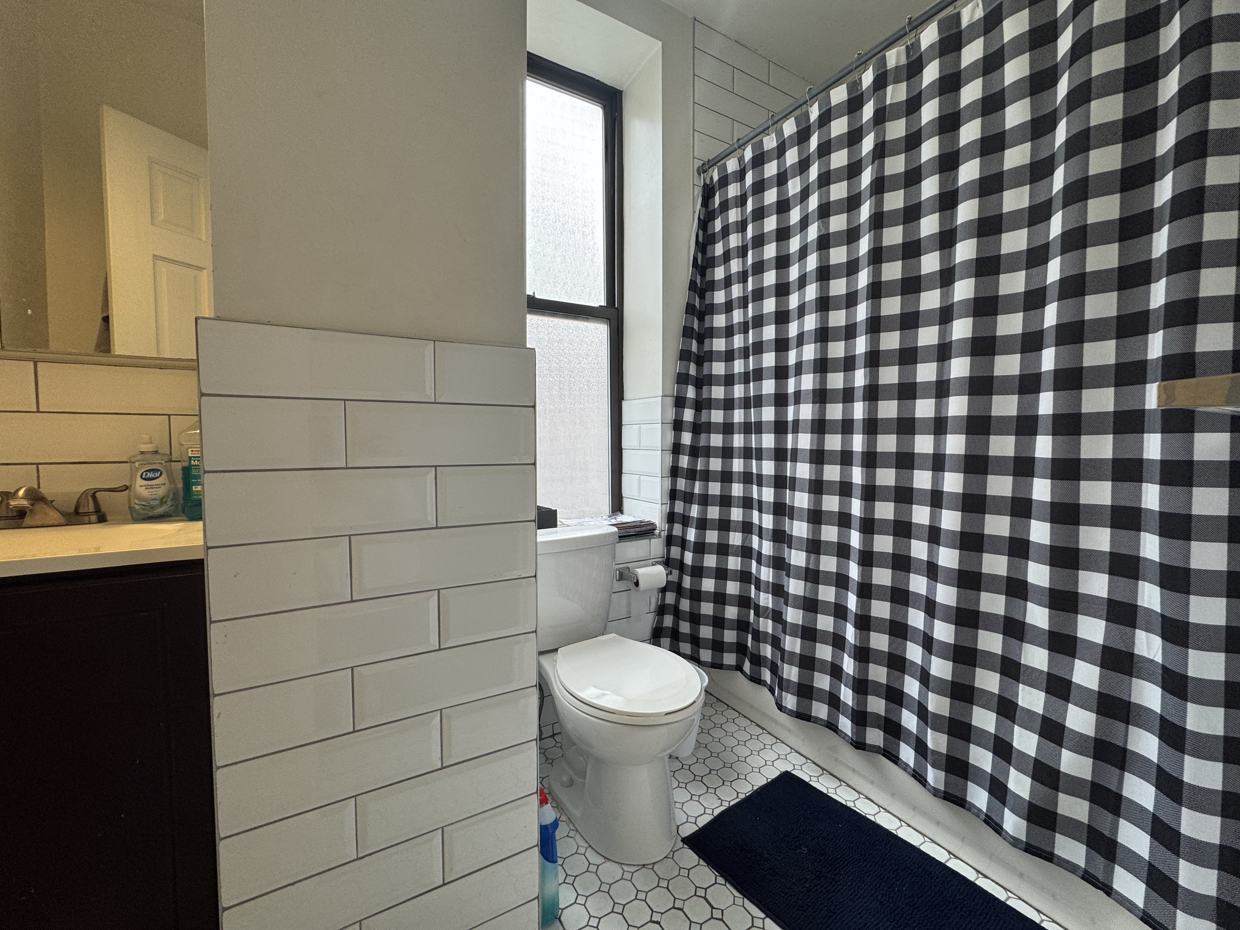 108 Stanton Street, Unit 1A Manhattan, NY 10002 - Photo 11 of 11 a bathroom with a toilet and a shower
