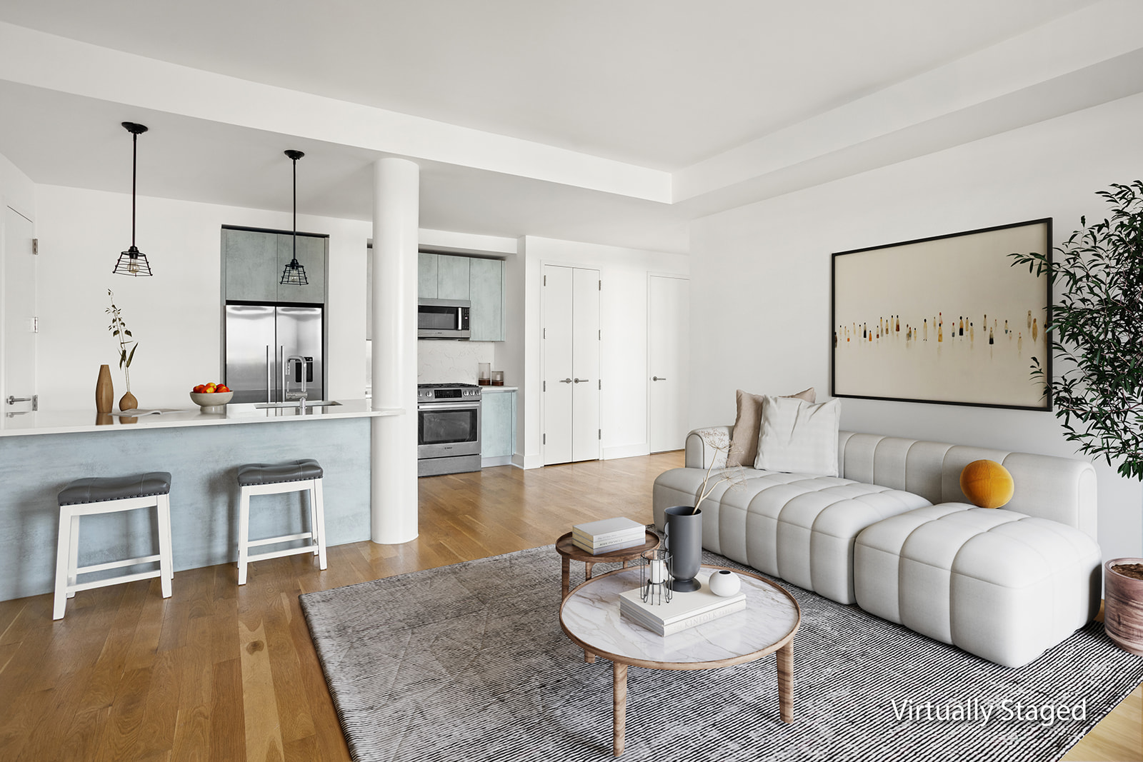 a living room with furniture and kitchen view