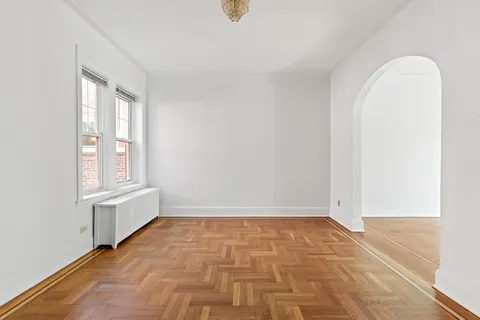 a view of an empty room and window