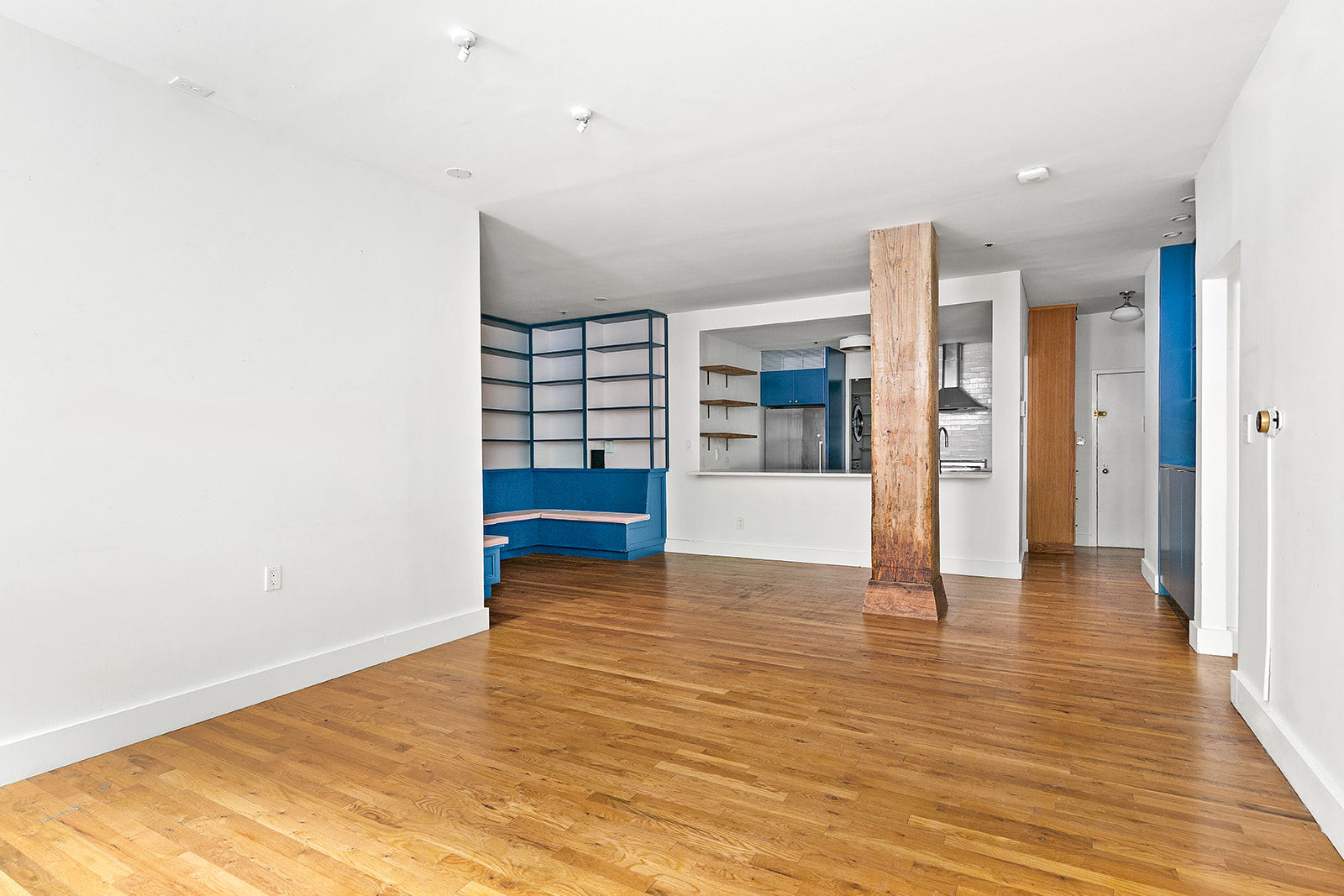 372 Dekalb Avenue, Unit 1I Brooklyn, NY 11205 - Photo 5 of 11 a view of empty room with wooden floor and cabinet