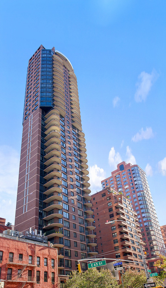 304 East 65th Street, Unit 6D Manhattan, NY 10065 - Photo 13 of 15 a view of a tall building