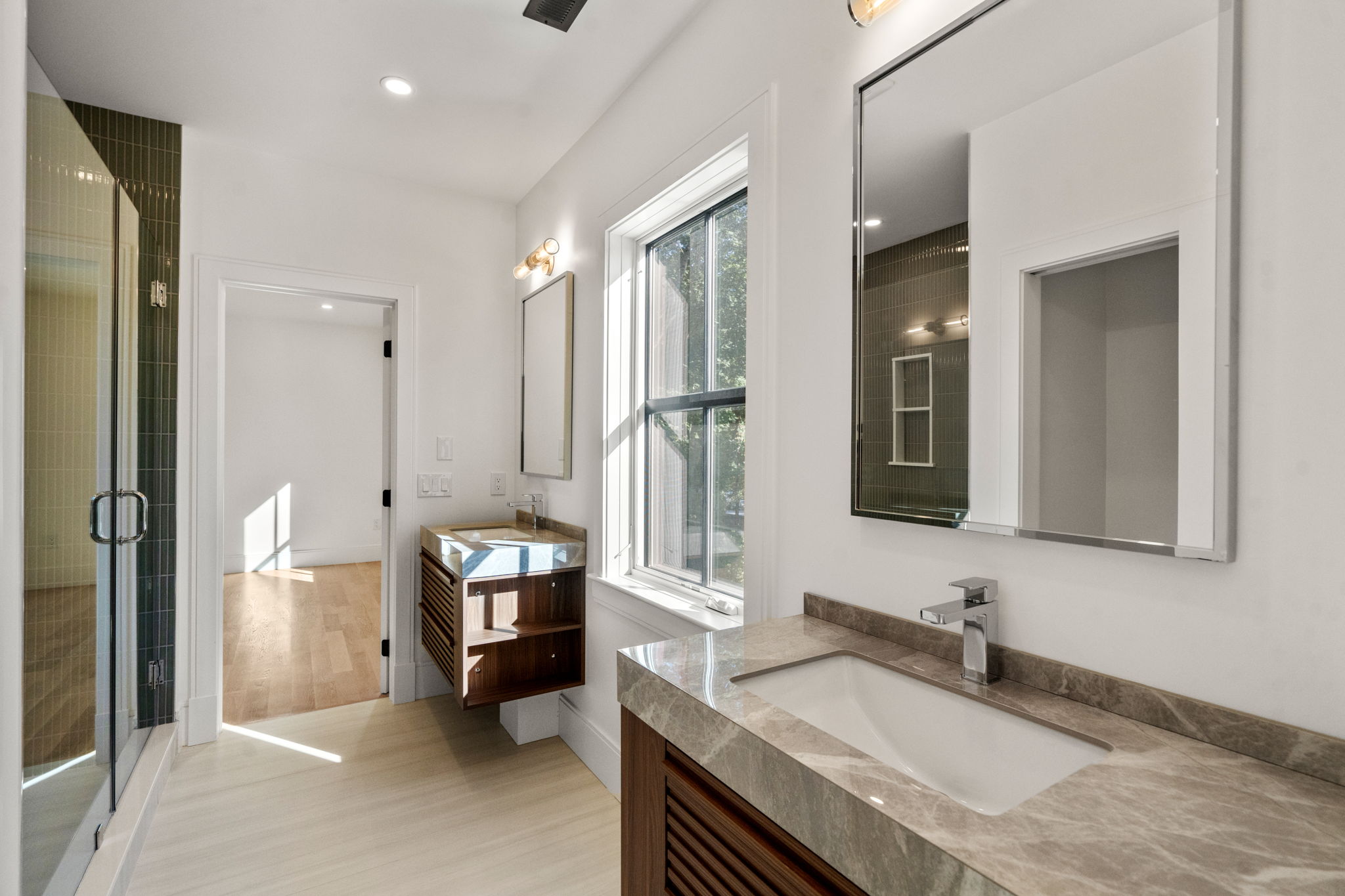 20 Oakland Street Wellesley, MA 02481 - Photo 19 of 30 a en suite bathroom with a granite countertop sink and a mirror