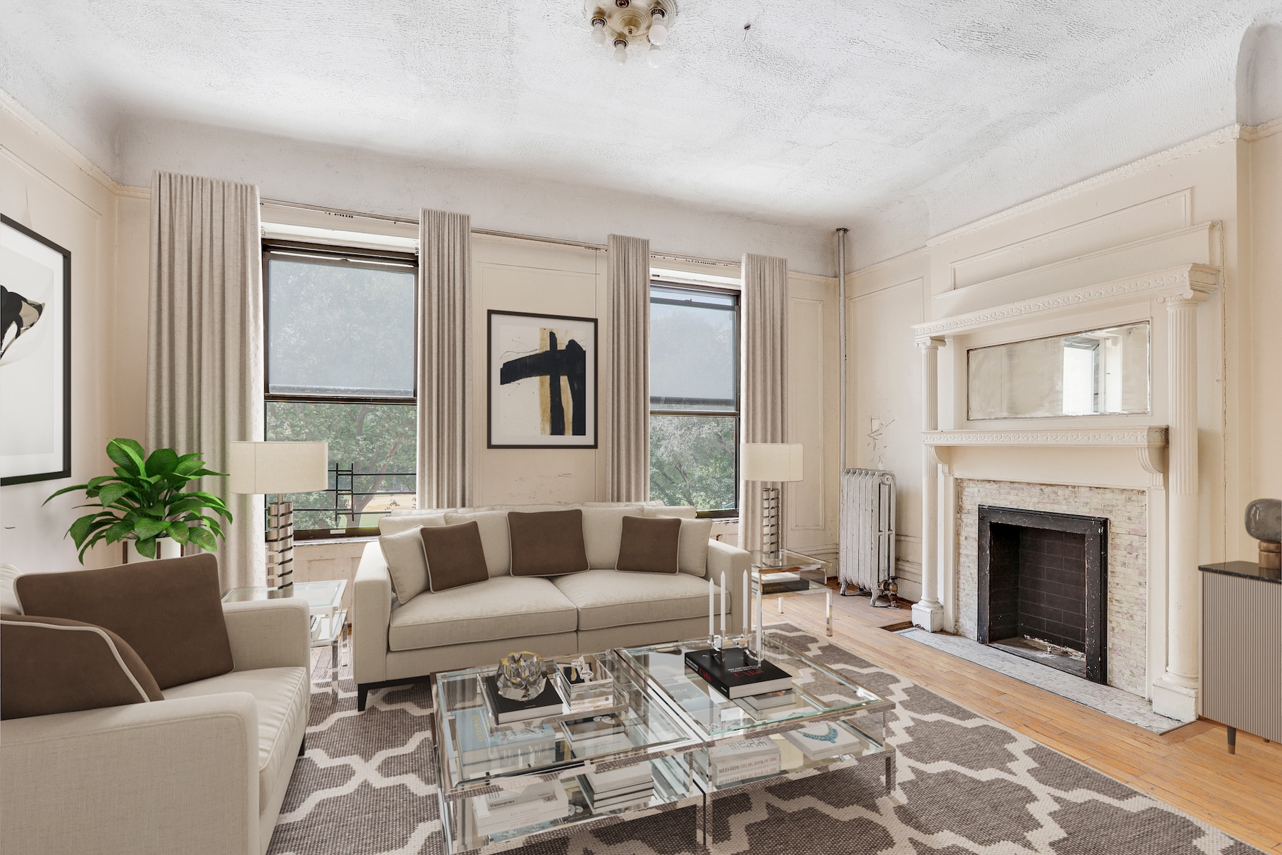a living room with furniture and a fireplace