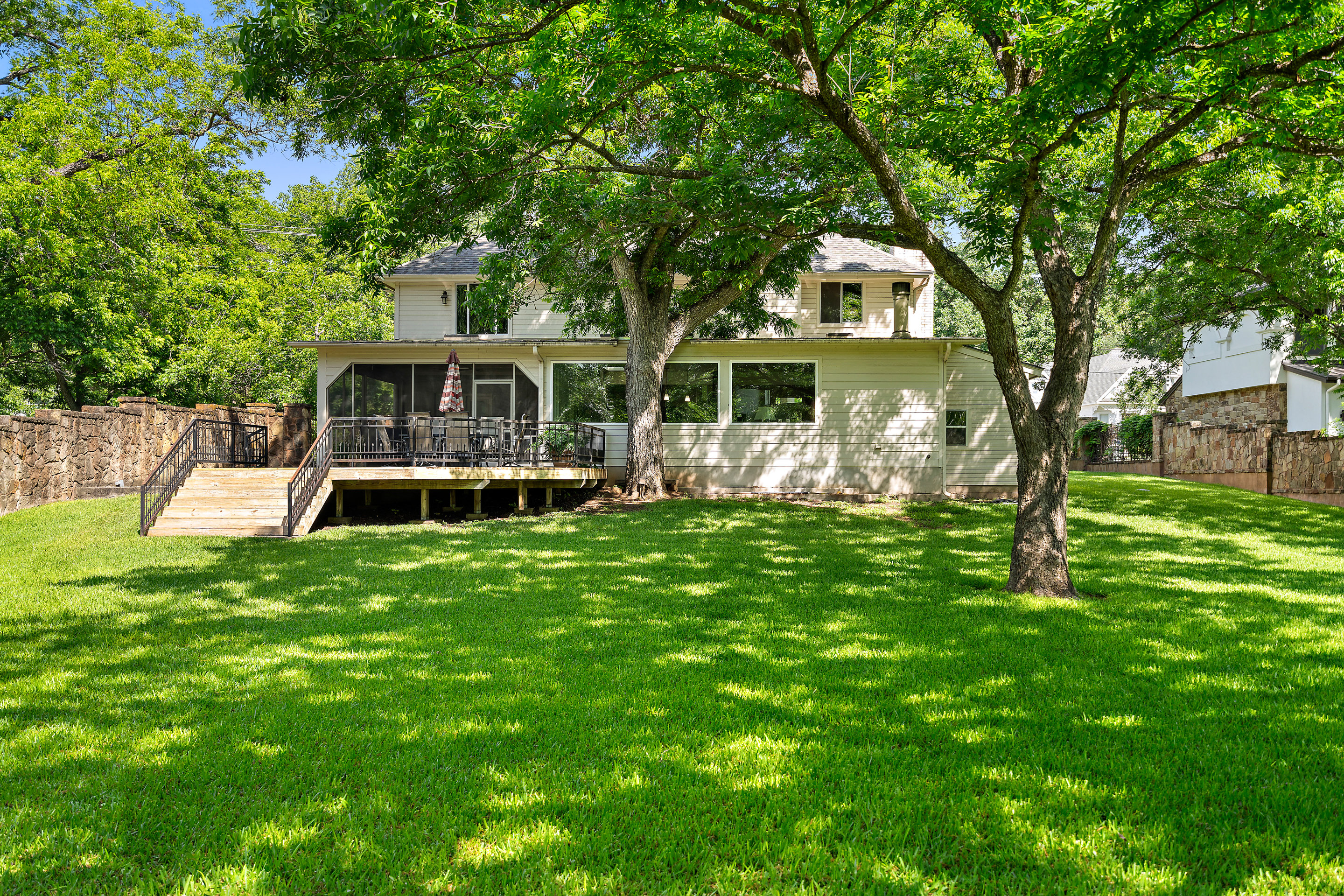2603 Pearce Road Austin, TX 78730 - Photo 37 of 41 a front view of a house with garden