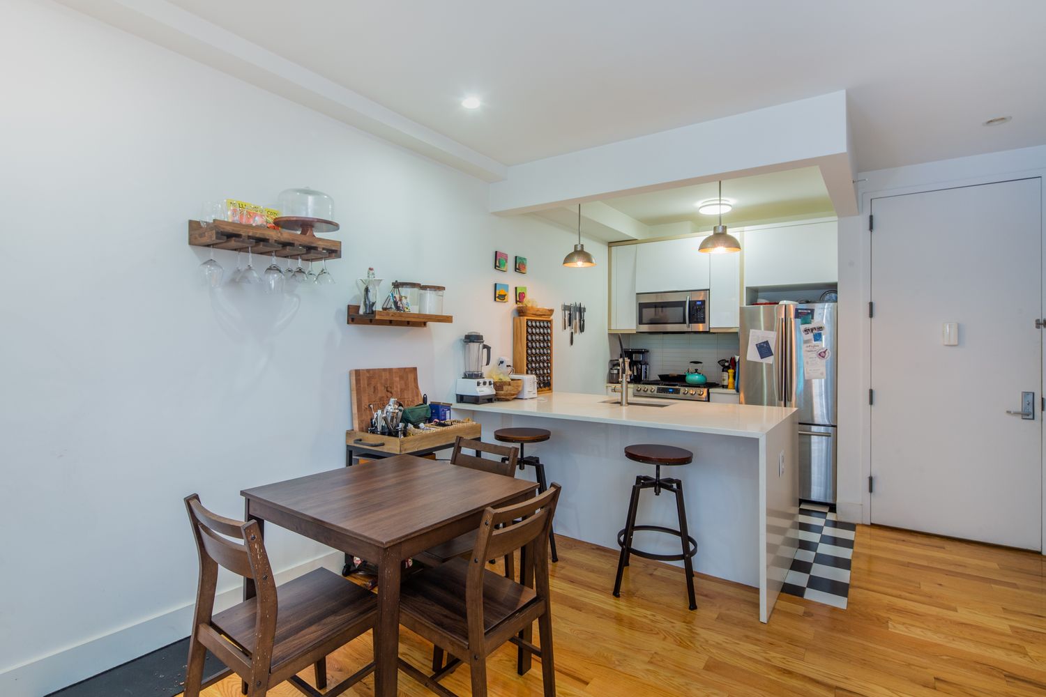 1204 Saint Marks Avenue, Unit 2R Brooklyn, NY 11213 - Photo 2 of 7 a view of a dining room with furniture and wooden floor
