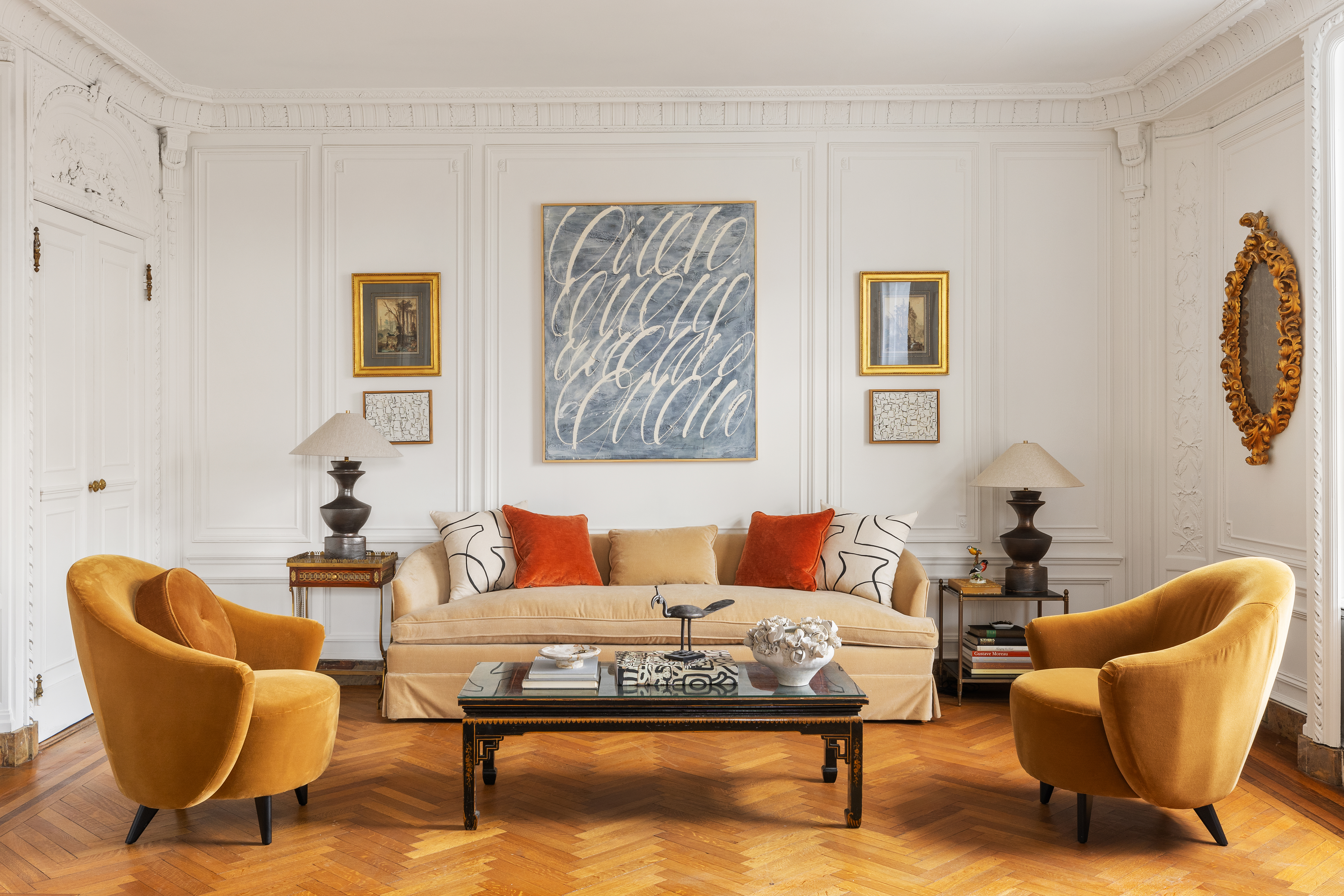 1136 5th Avenue, Unit 6A Manhattan, NY 10128 - Photo 11 of 44 a living room with furniture a rug and a lamp