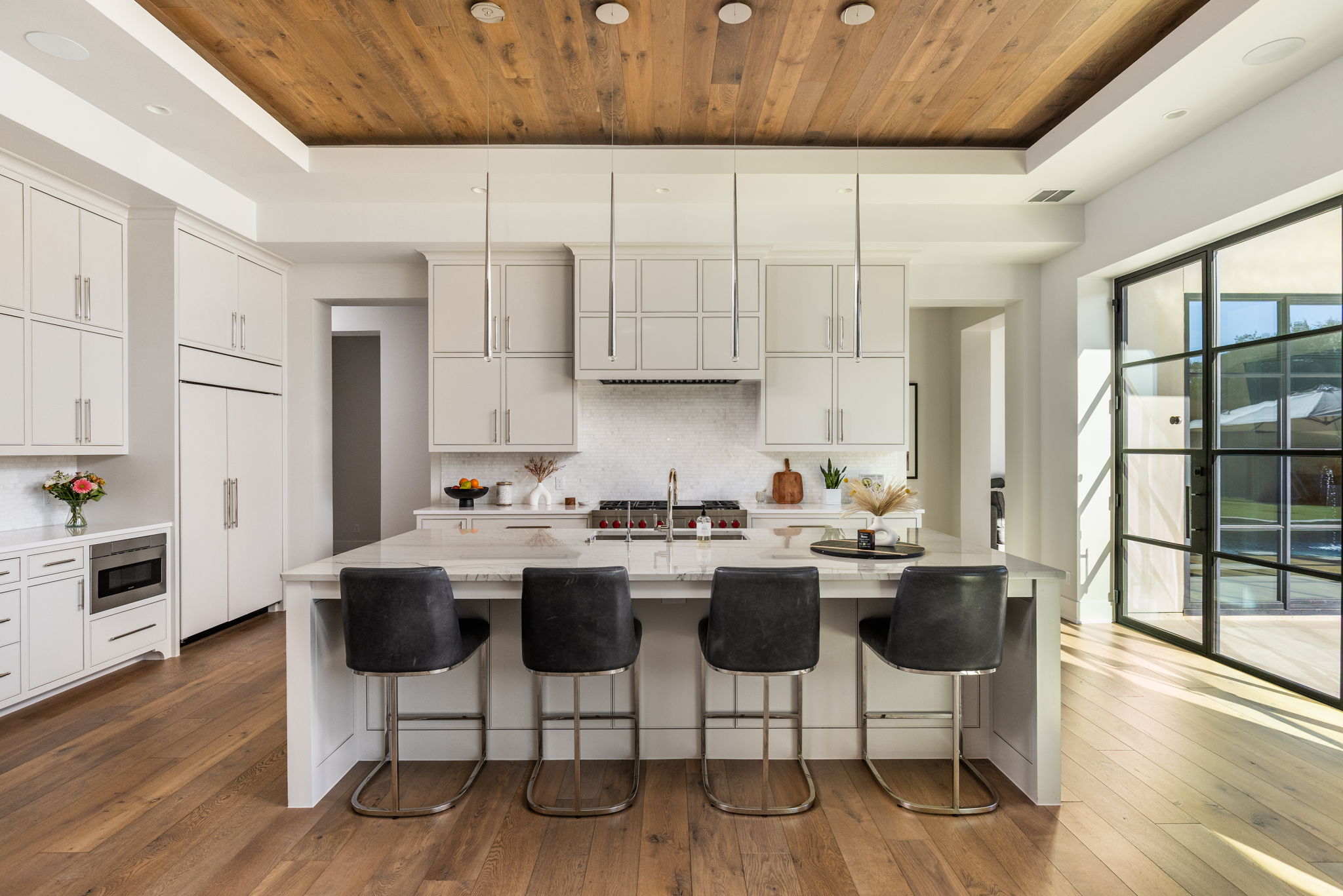 522 Delayne Drive Austin, TX 78737 - Photo 18 of 23 a kitchen with a sink cabinets and wooden floor