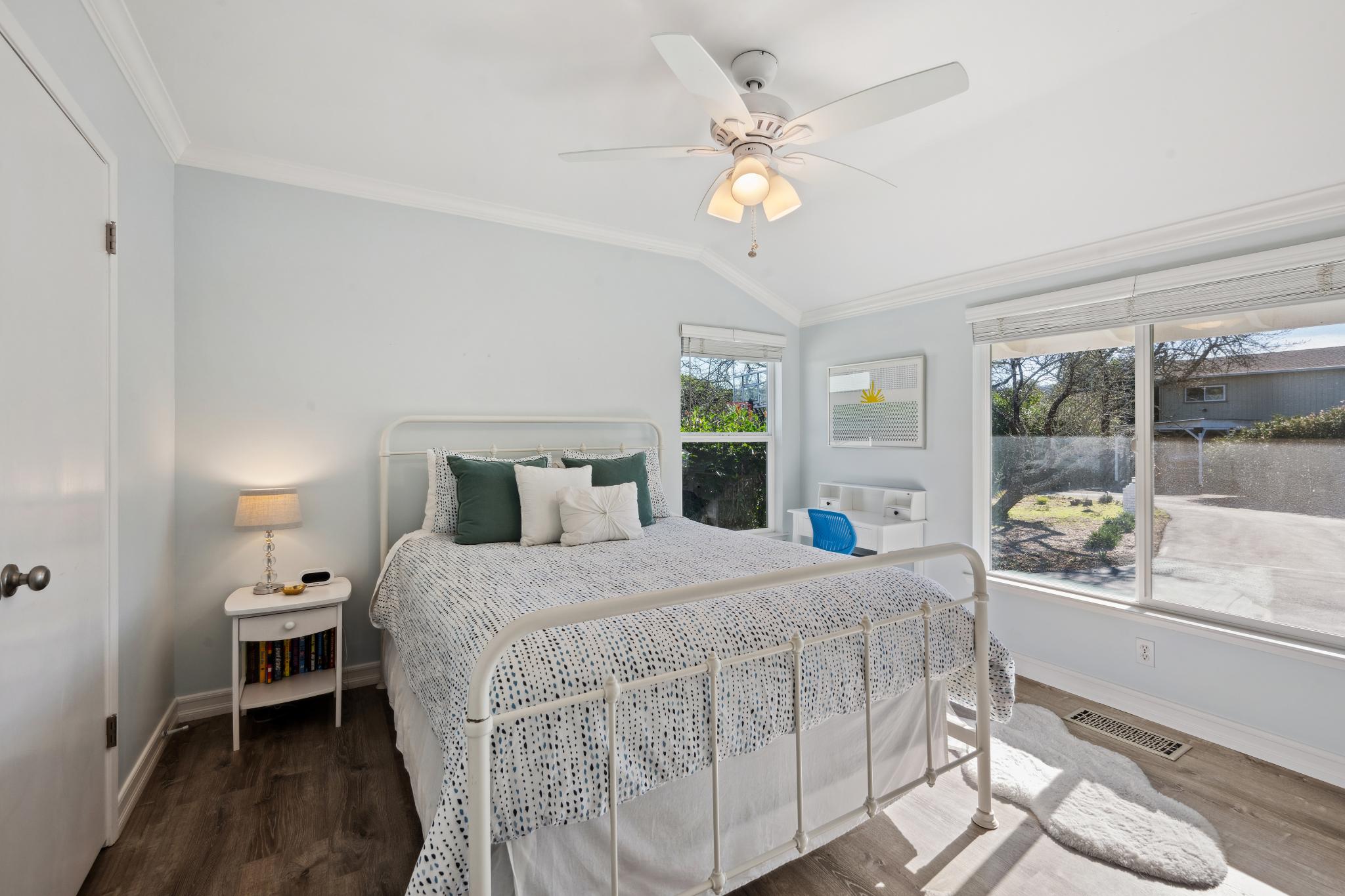 123 Frey Road Santa Rosa, CA 95409 - Photo 49 of 62 a bedroom with a bed and a large window