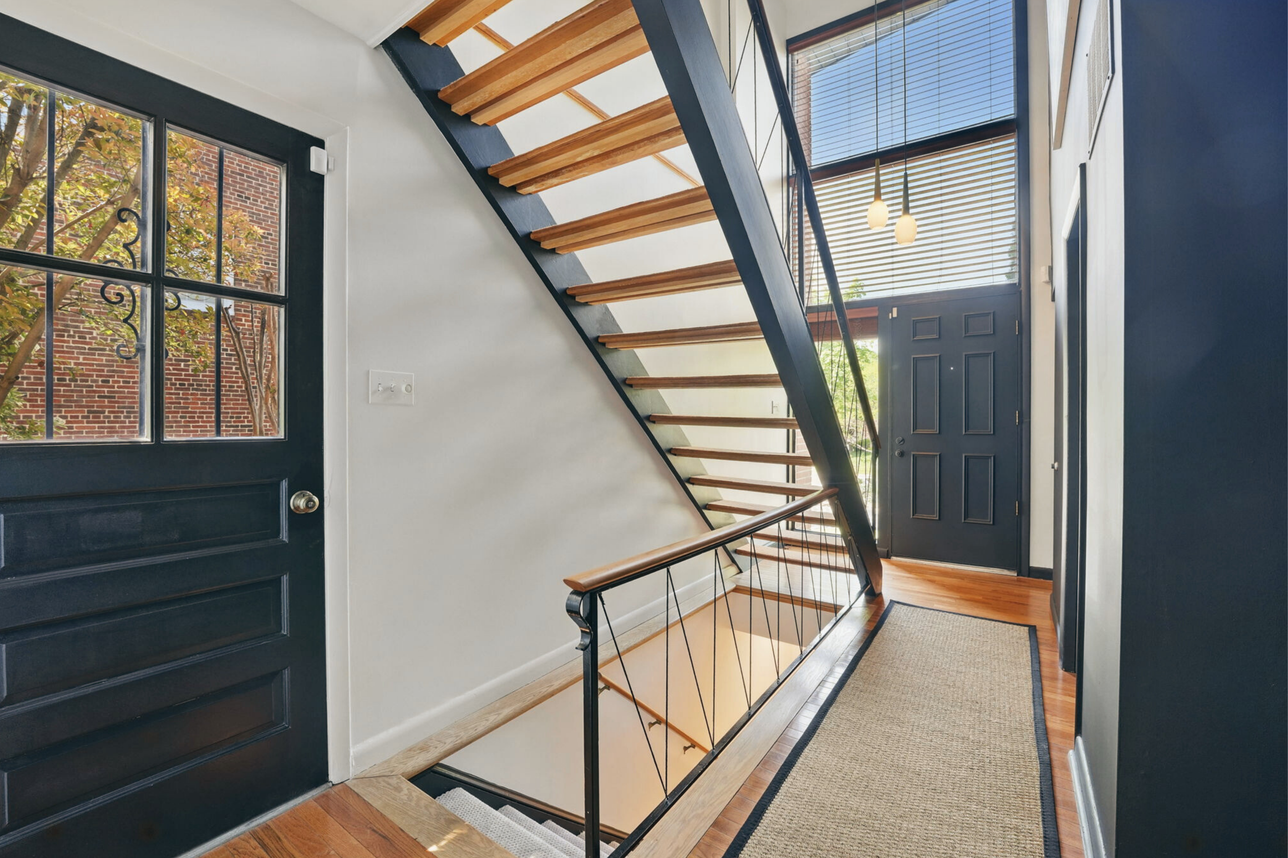 8003 16th Street Northwest Washington, DC 20012 - Photo 12 of 38 a view of staircase with large window