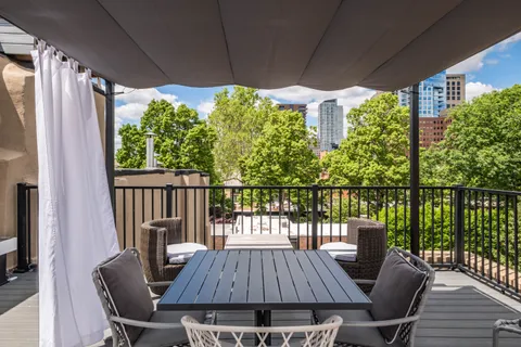 a front view of a house with stairs