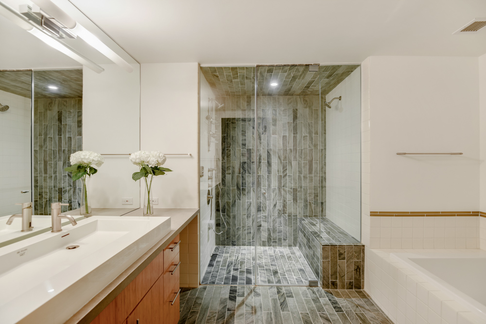 135 West 4th Street, Unit 3E Manhattan, NY 10012 - Photo 10 of 11 a bathroom with a bathtub shower sink and toilet