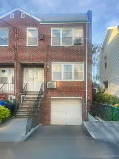 front view of a house with a street