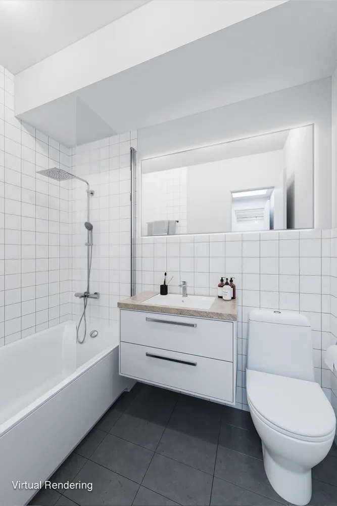 a bathroom with a sink a toilet and bathtub