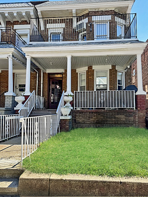 367 East 2nd Street Brooklyn, NY 11218 - Photo 2 of 3 a view of a house with a yard and deck