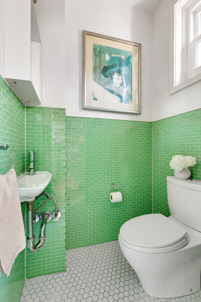 856 St Johns Place Brooklyn, NY 11216 - Photo 4 of 14 a bathroom with a toilet and a sink