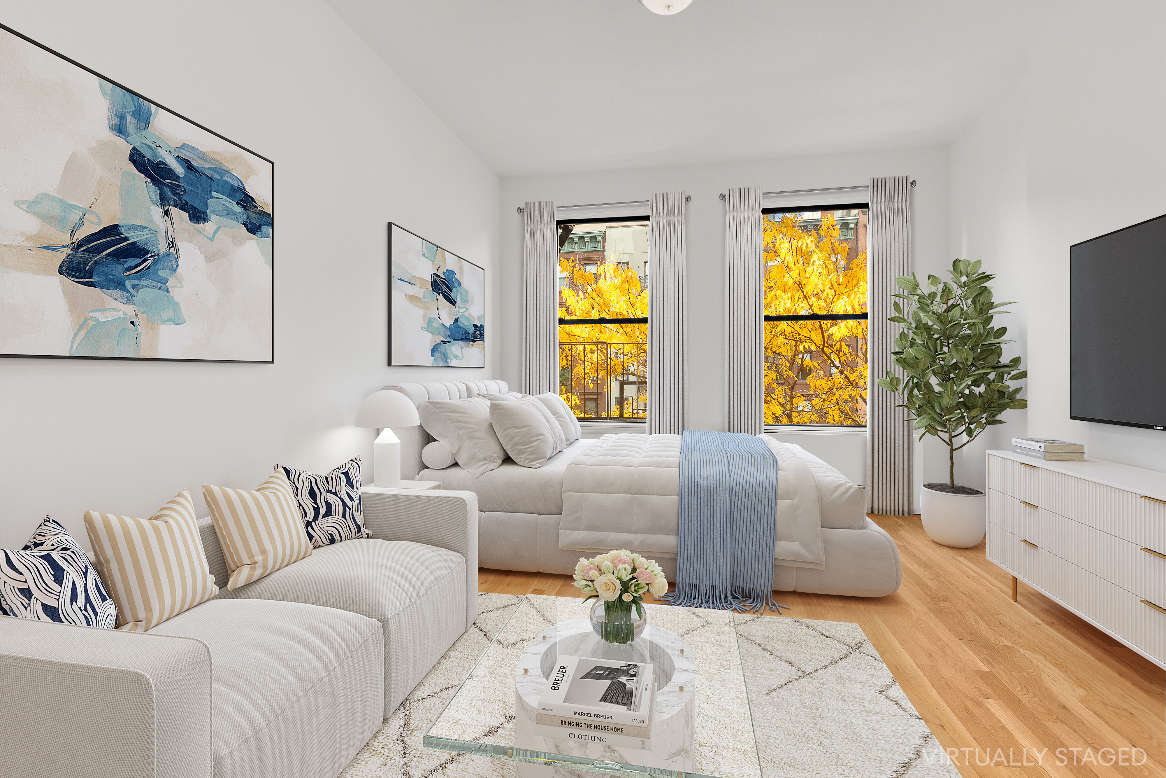 a living room with furniture and a flat screen tv