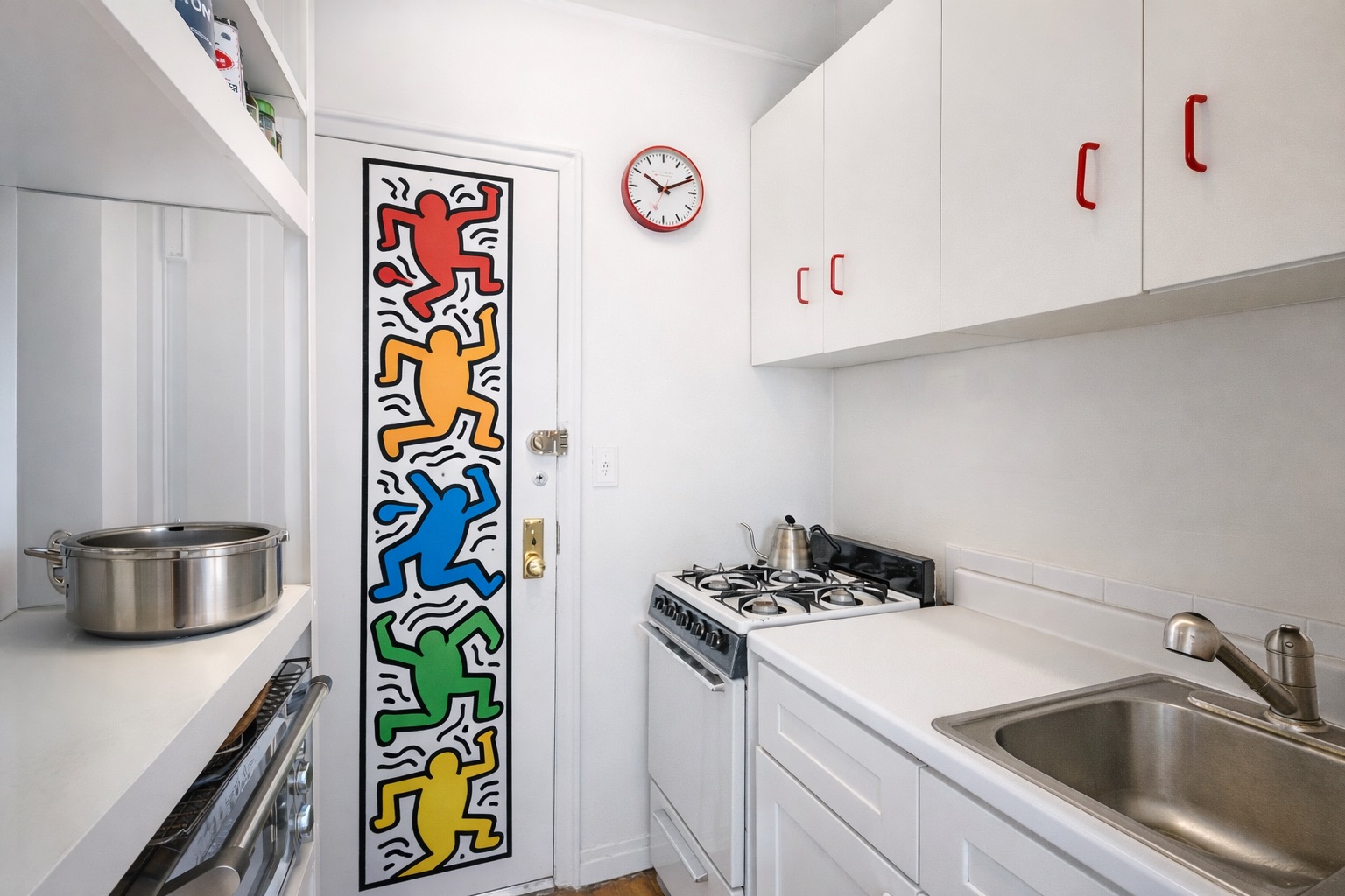 101 West 80th Street, Unit 2C Manhattan, NY 10024 - Photo 5 of 7 a kitchen with stainless steel appliances a refrigerator and a sink