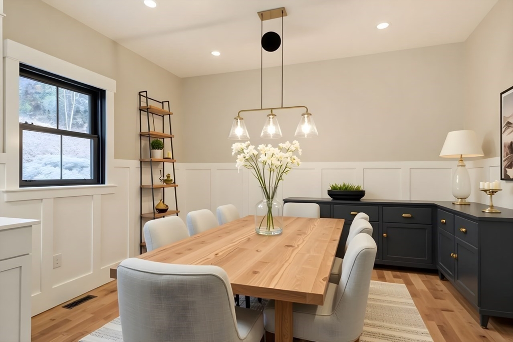 171 Randall Road Berlin, MA 01503 - Photo 12 of 41 a dining room with a table and chairs
