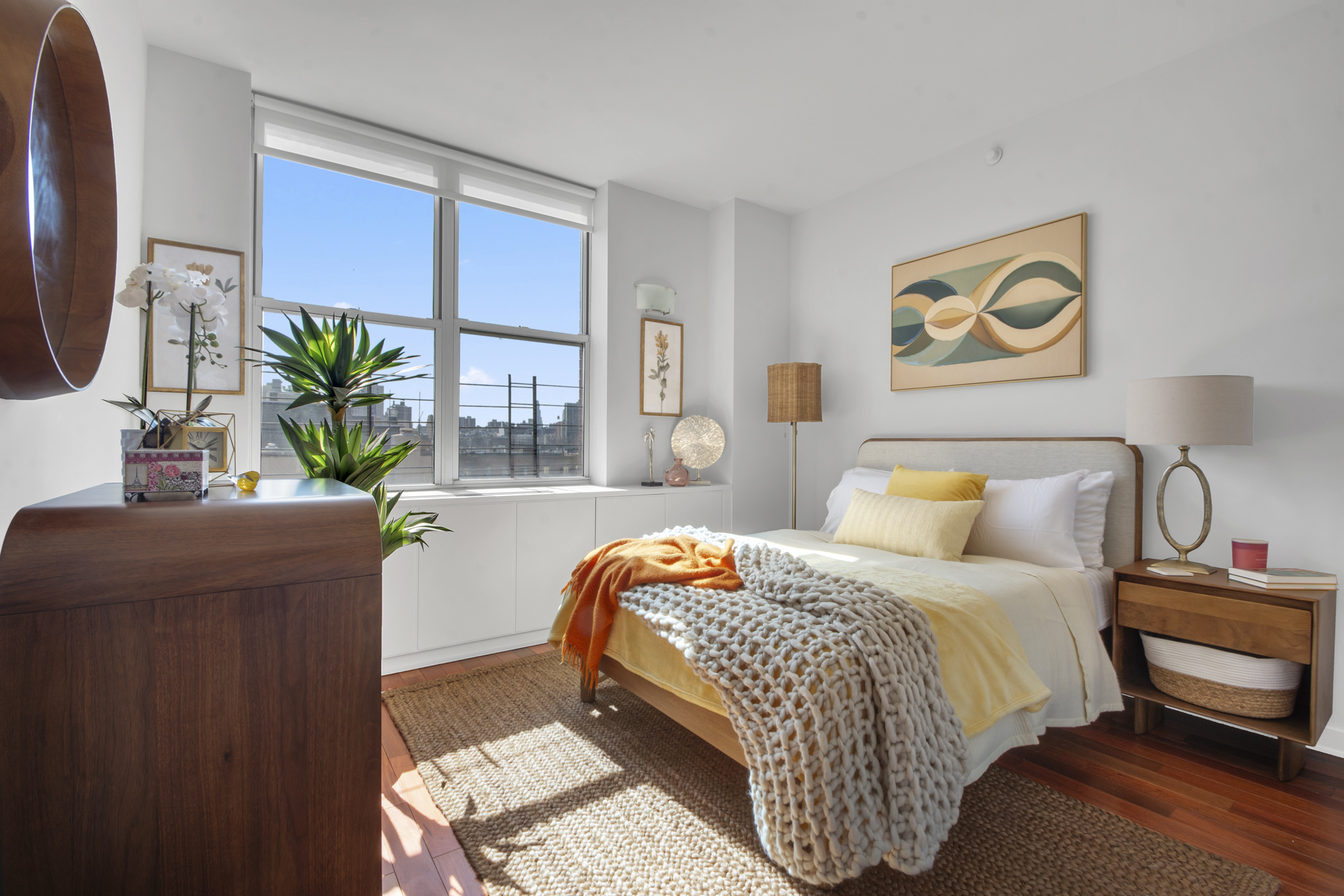 301 West 118th Street, Unit PH1F Manhattan, NY 10026 - Photo 11 of 15 a bedroom with bed and a potted plant