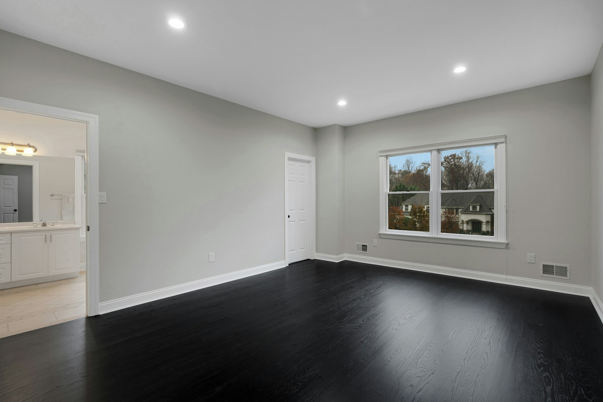 3 Kensington Court Warren, NJ 07059 - Photo 49 of 66 an empty room with wooden floor and windows