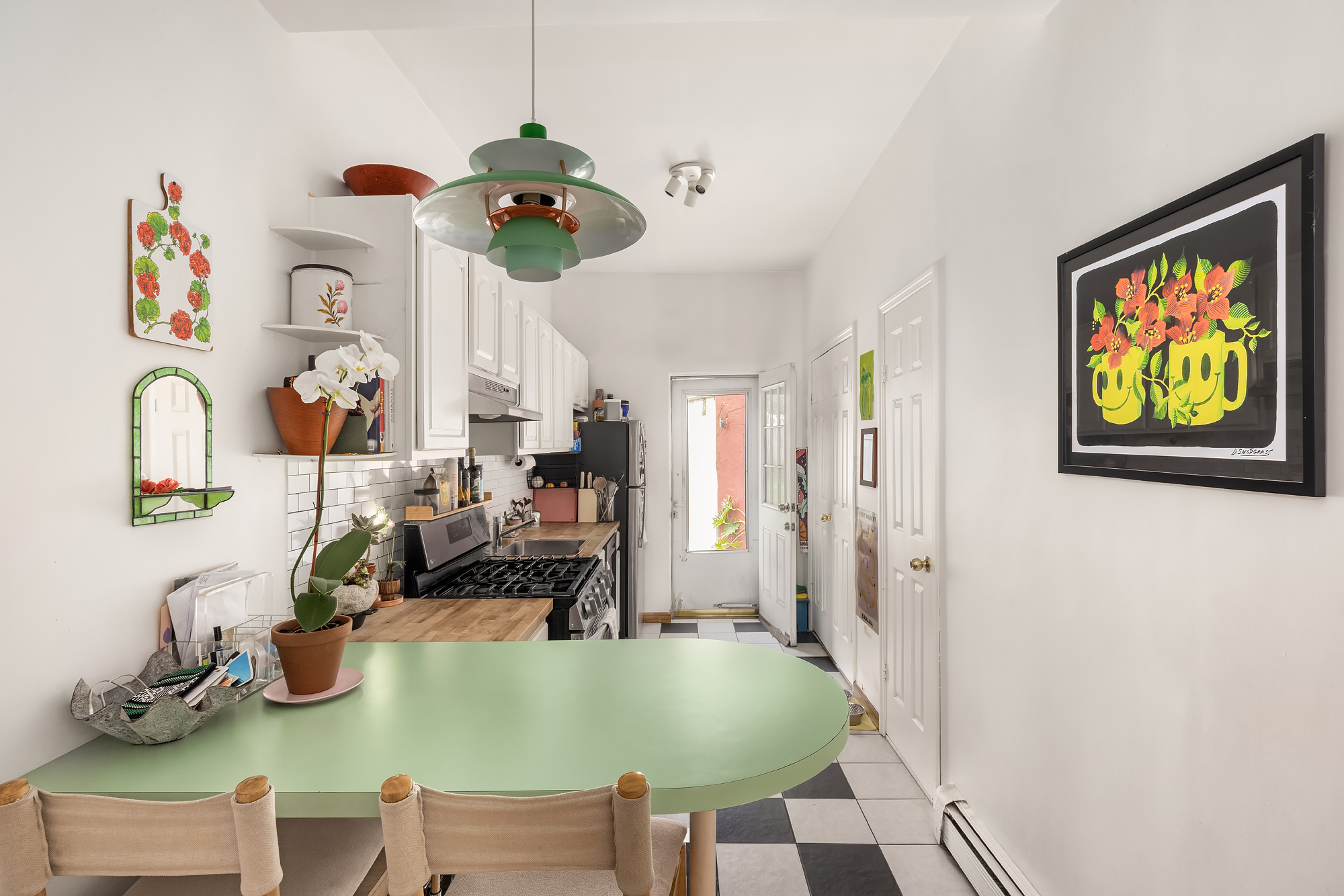 18 Russell Street Brooklyn, NY 11222 - Photo 7 of 24 a dining room with table and chairs