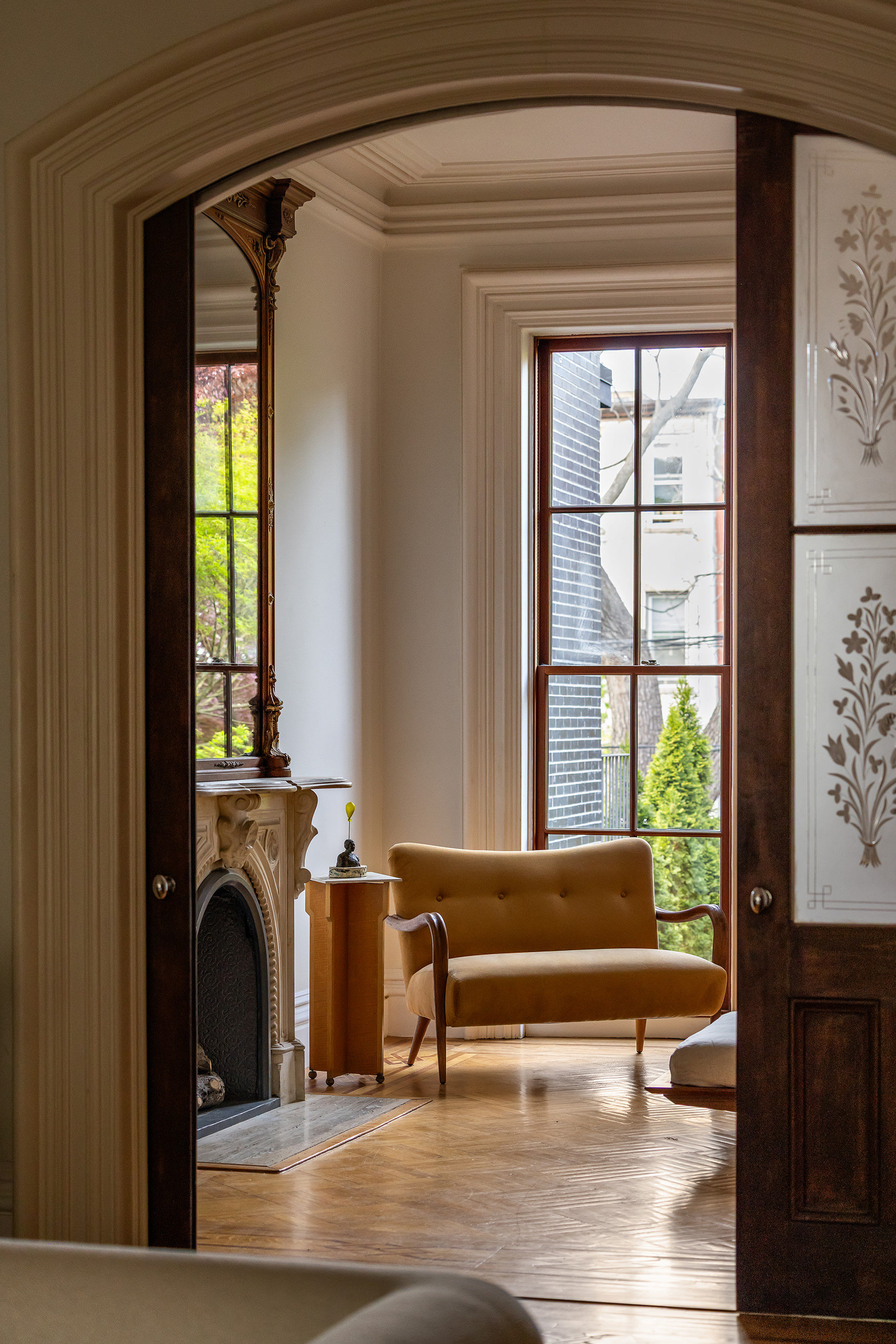 177 Prospect Place Brooklyn, NY 11238 - Photo 6 of 42 a living room with a fireplace and a window