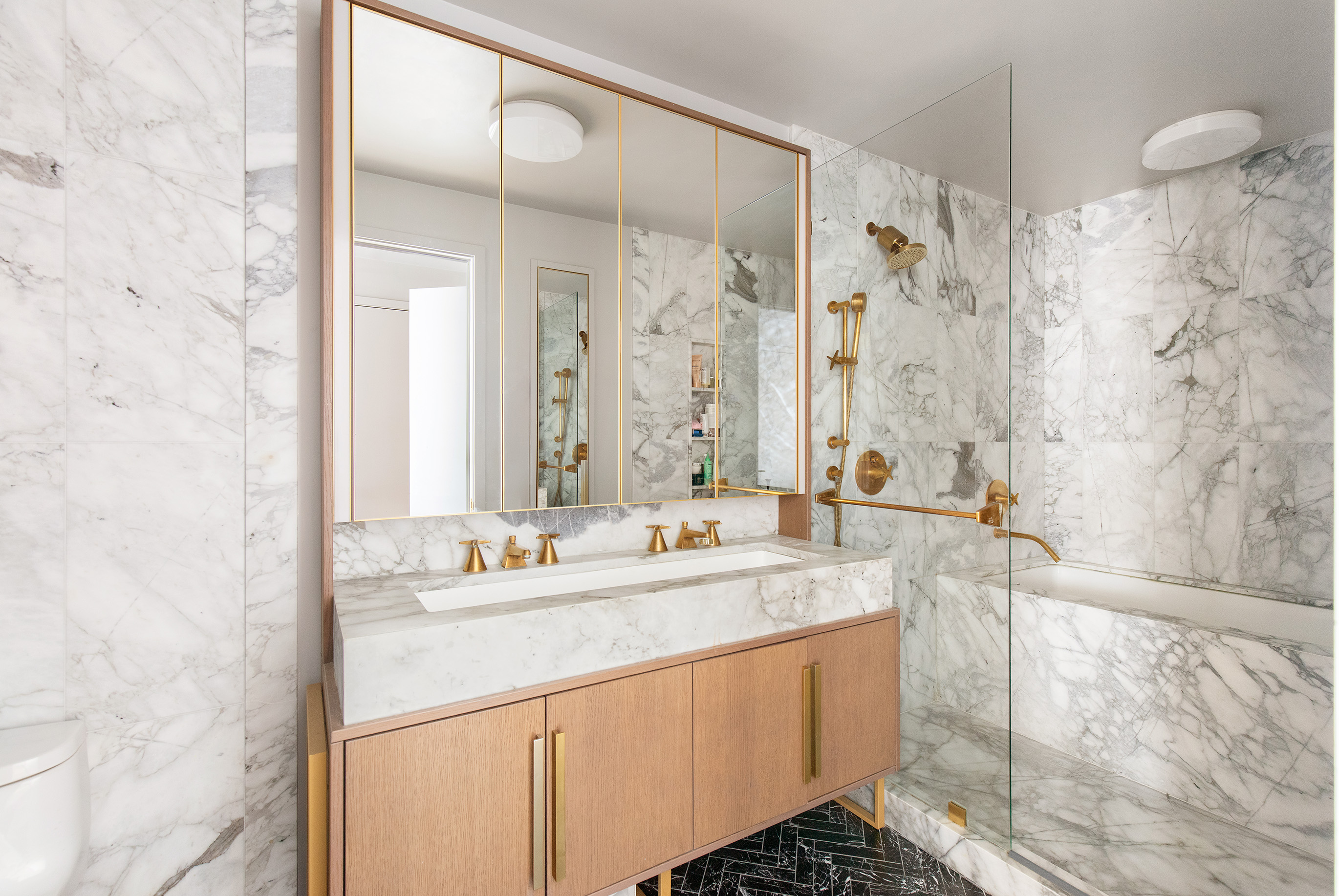 243 4th Avenue, Unit 6B Brooklyn, NY 11215 - Photo 7 of 8 a bathroom with a double vanity sink mirror and shower