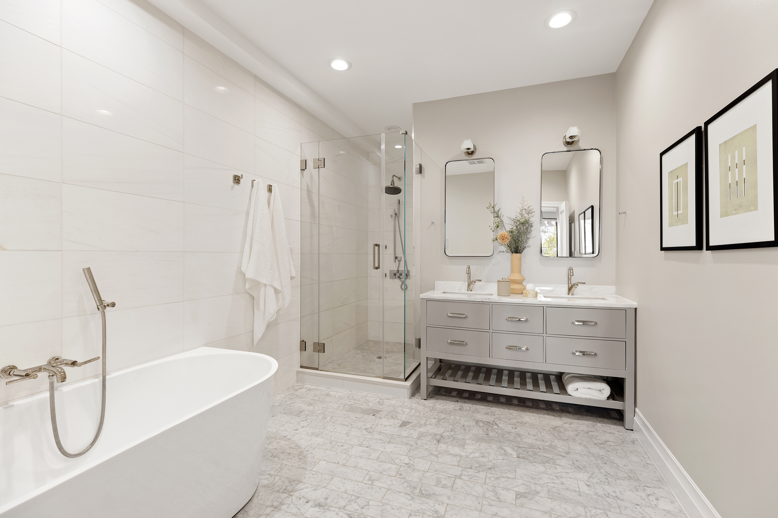 203 Halsey Street Brooklyn, NY 11216 - Photo 7 of 21 a bathroom with a tub sink shower and mirror