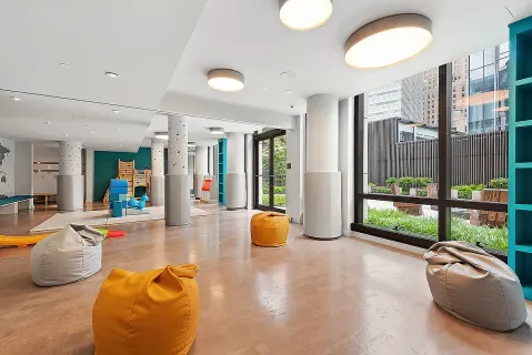 a view of a building with sitting area