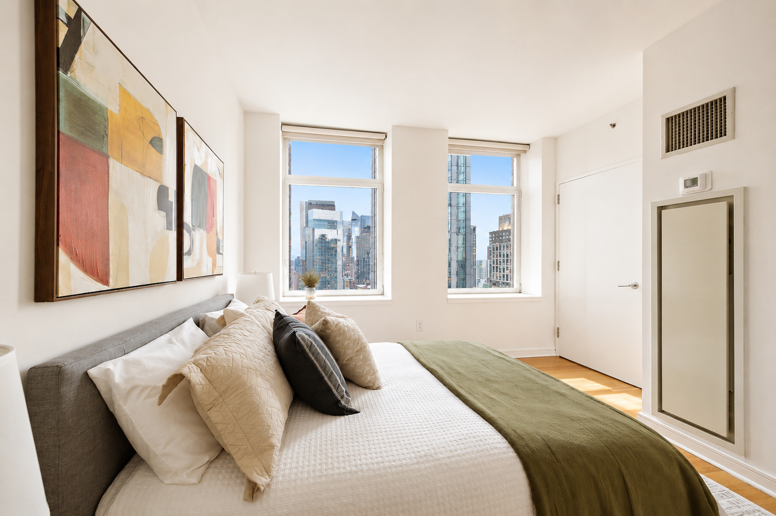 11 East 29th Street, Unit 34B Manhattan, NY 10016 - Photo 6 of 10 a bedroom with a bed and a window
