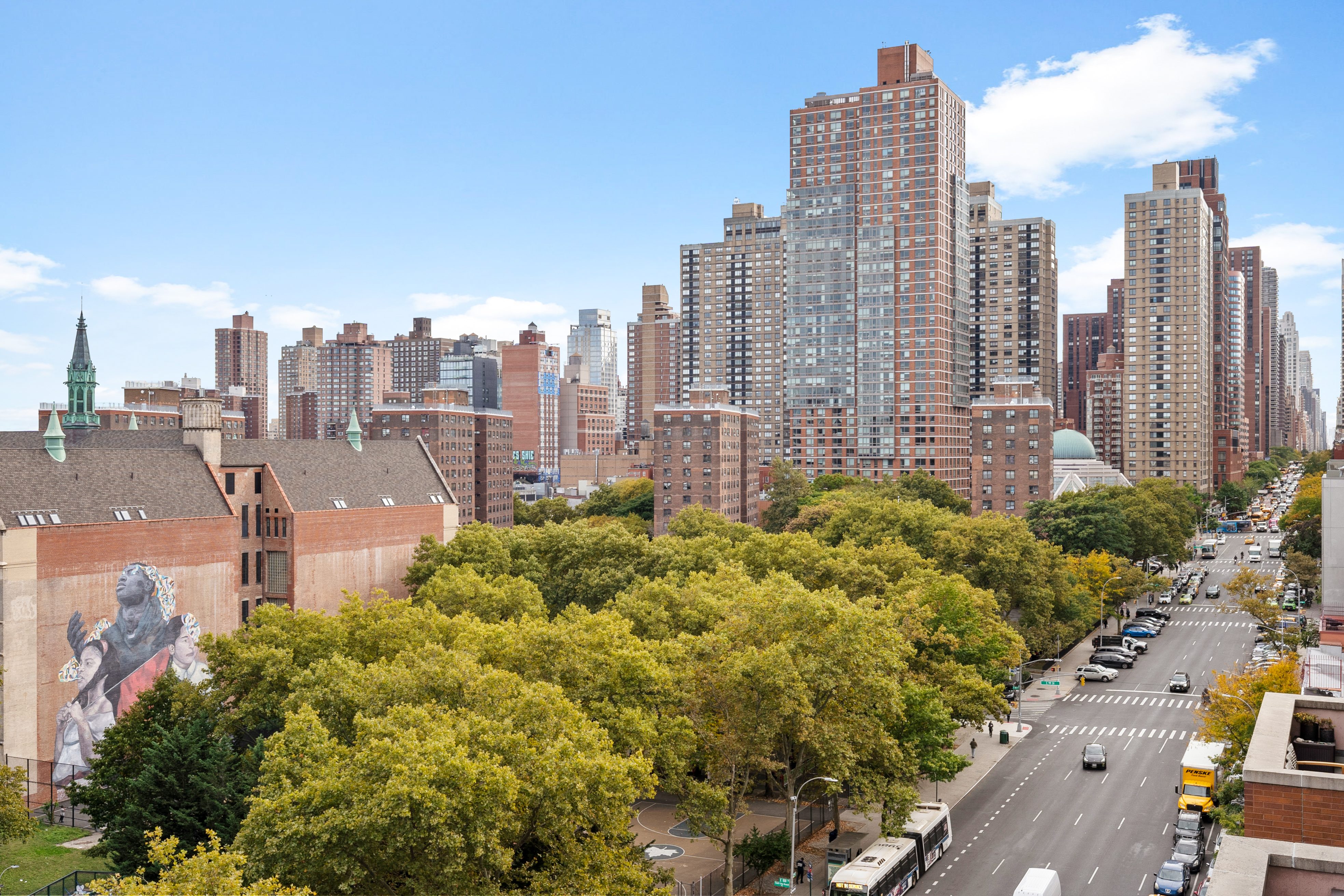 1810 3rd Avenue, Unit A9B Manhattan, NY 10029 - Photo 12 of 16 a view of a city with tall buildings
