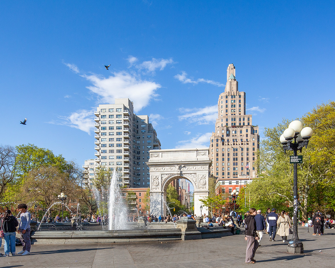 184 Thompson Street, Unit 2V Manhattan, NY 10012 - Photo 6 of 8 a view of building with lot of cars parked on road