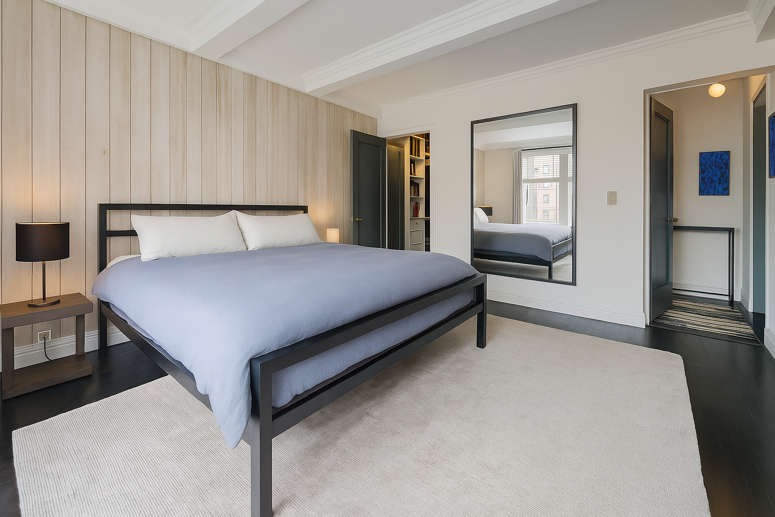 405 West 23rd Street, Unit 8E Manhattan, NY 10011 - Photo 2 of 4 a bedroom with a bed and a dresser