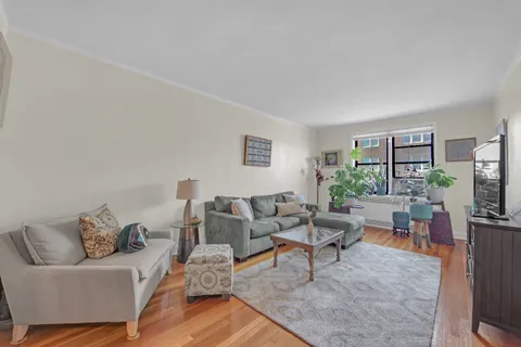 a living room with furniture and a couch