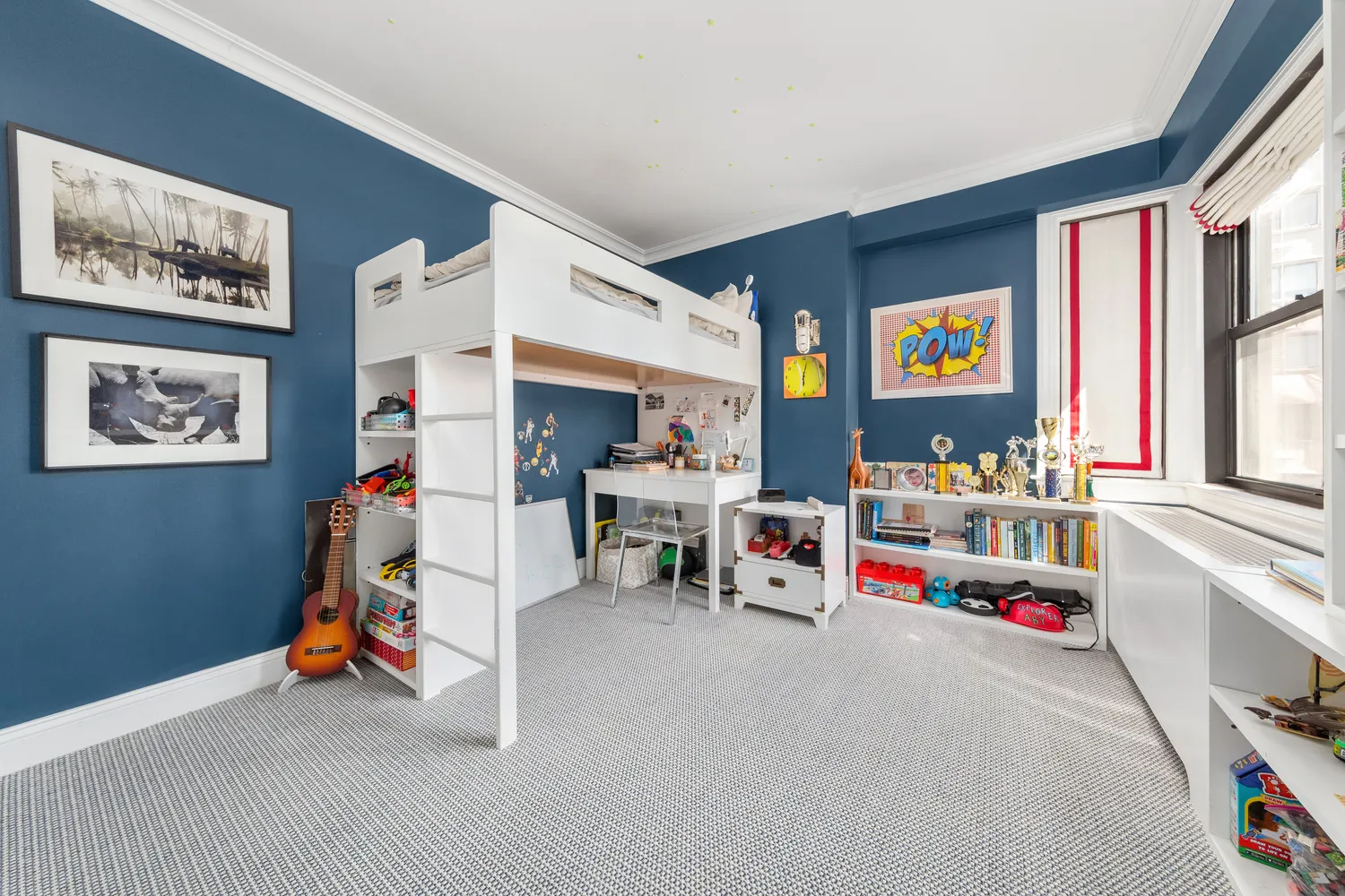 a living room with lots of furniture and a flat screen tv