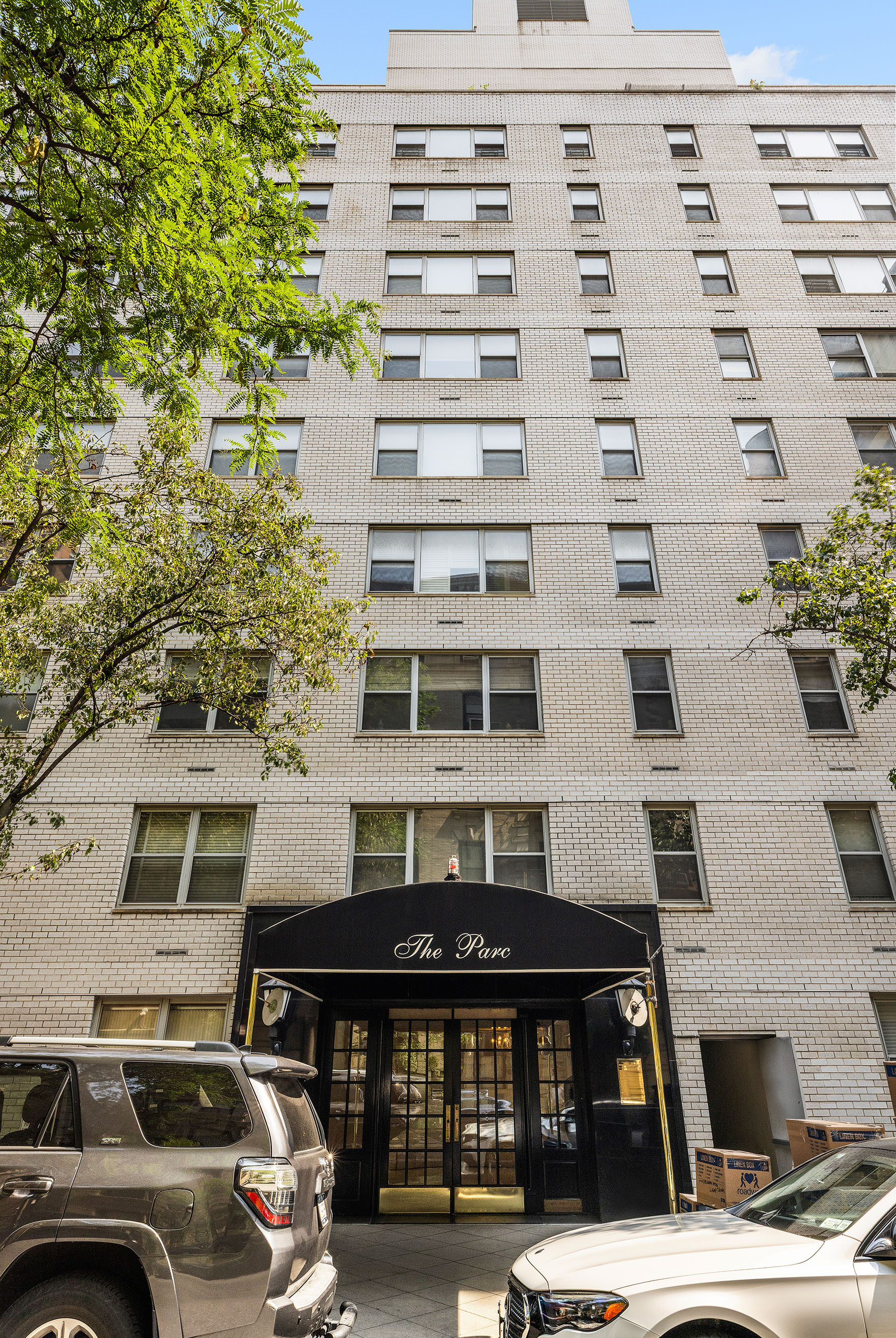 55 East 87th Street, Unit 9M Manhattan, NY 10128 - Photo 10 of 11 a front view of a building with parking space
