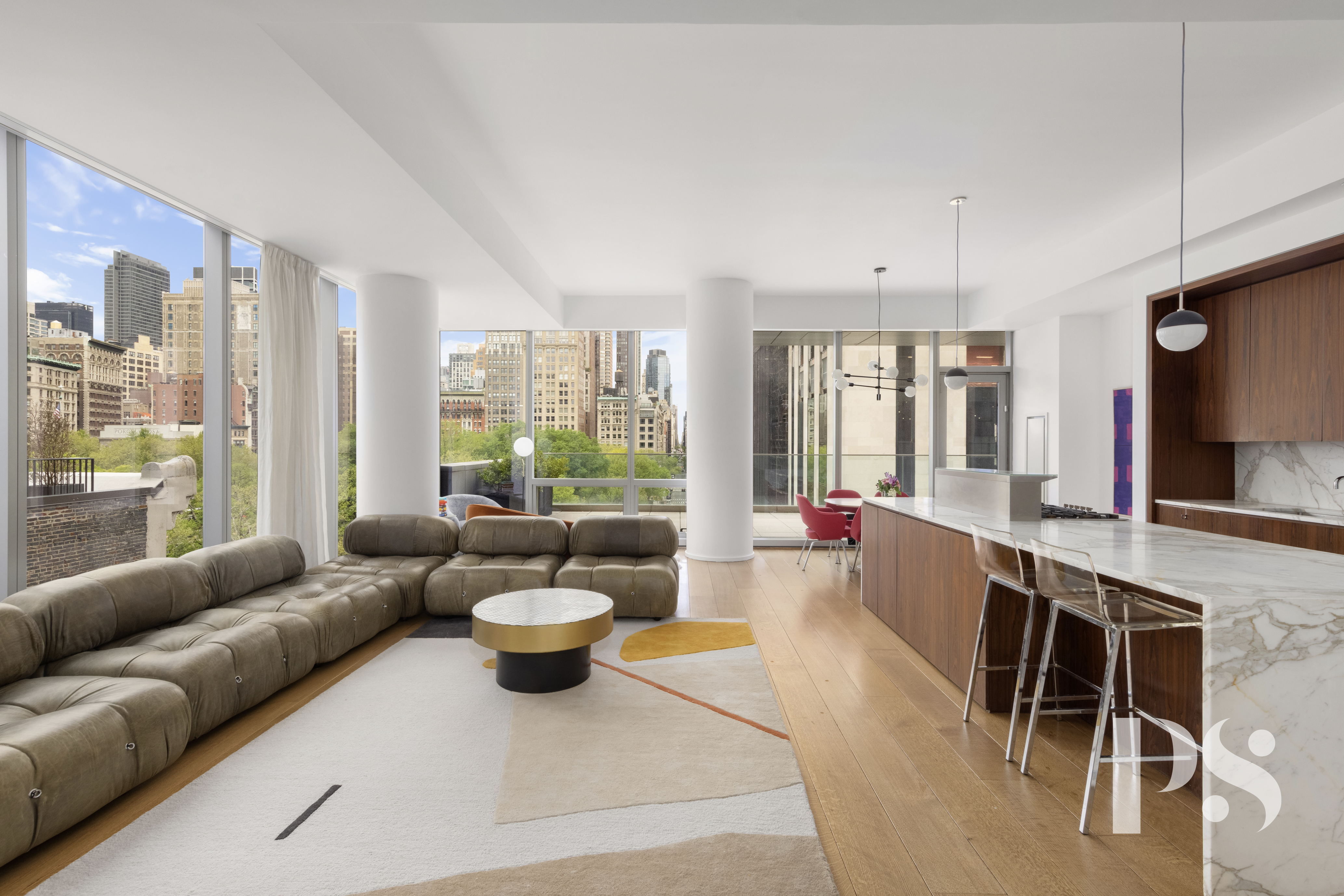 23 East 22nd Street, Unit 8A Manhattan, NY 10010 - Photo 3 of 25 a living room with furniture and a large window