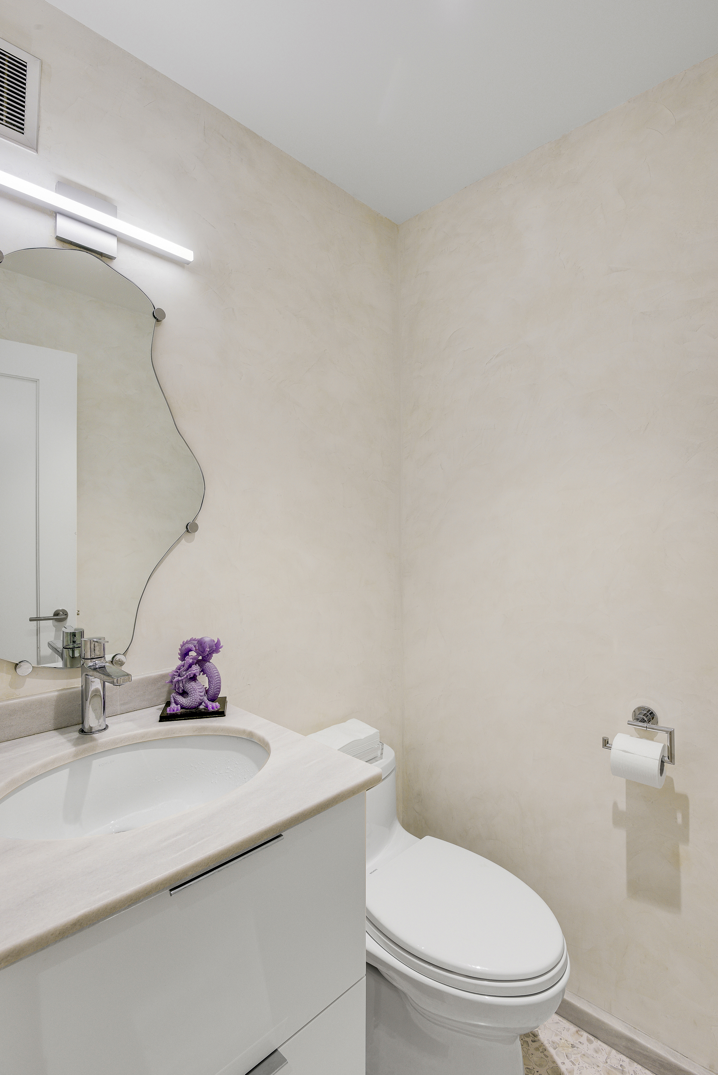 200 Central Park South, Unit 3Q Manhattan, NY 10019 - Photo 11 of 15 a bathroom with a sink and a toilet