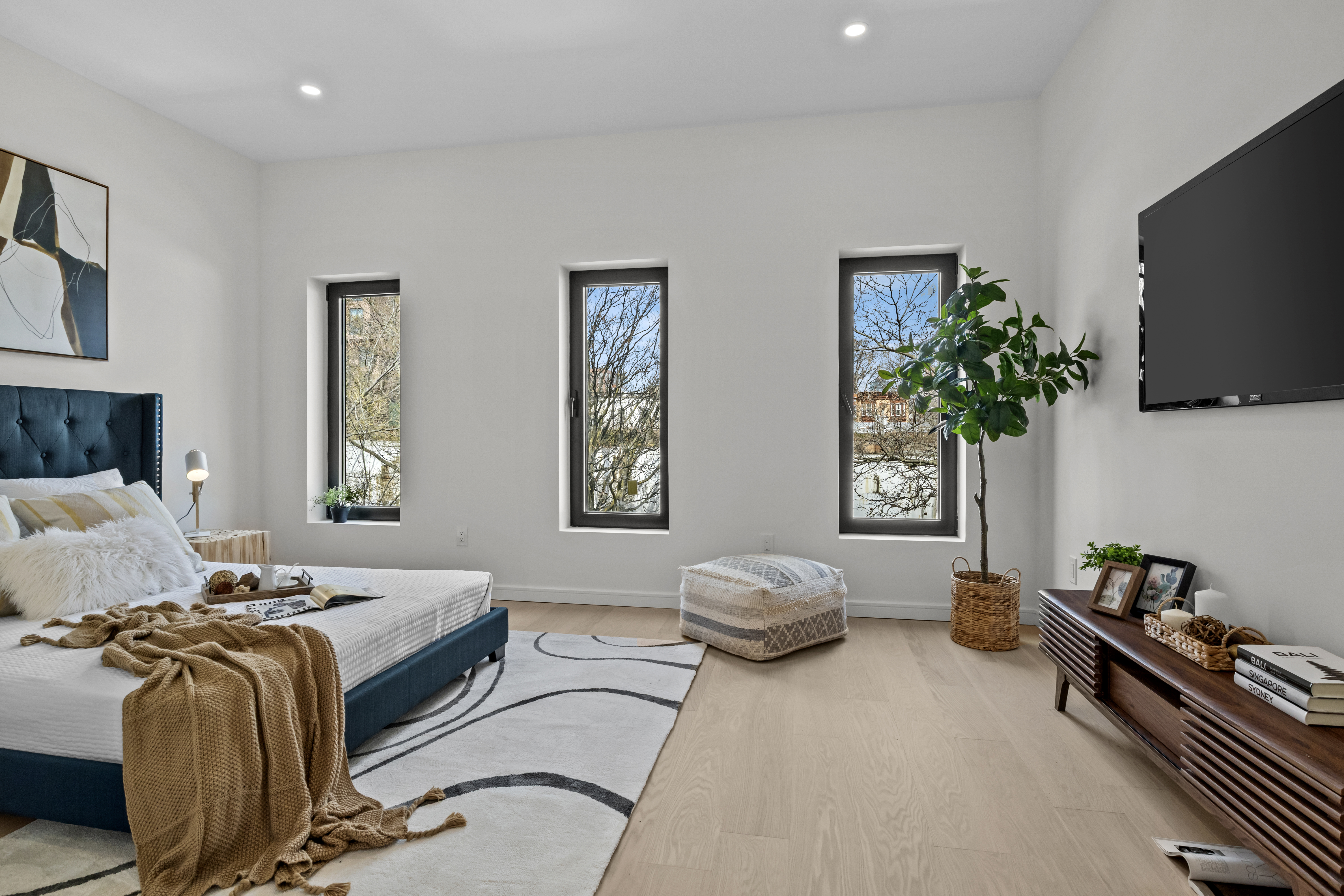 320 10th Street Brooklyn, NY 11215 - Photo 14 of 27 a bedroom with a bed and a flat screen tv