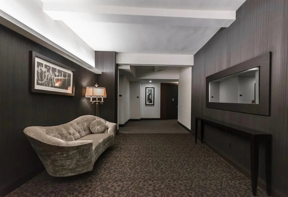 88 Greenwich Street, Unit 1218 Manhattan, NY 10006 - Photo 13 of 30 a living room with furniture and a window