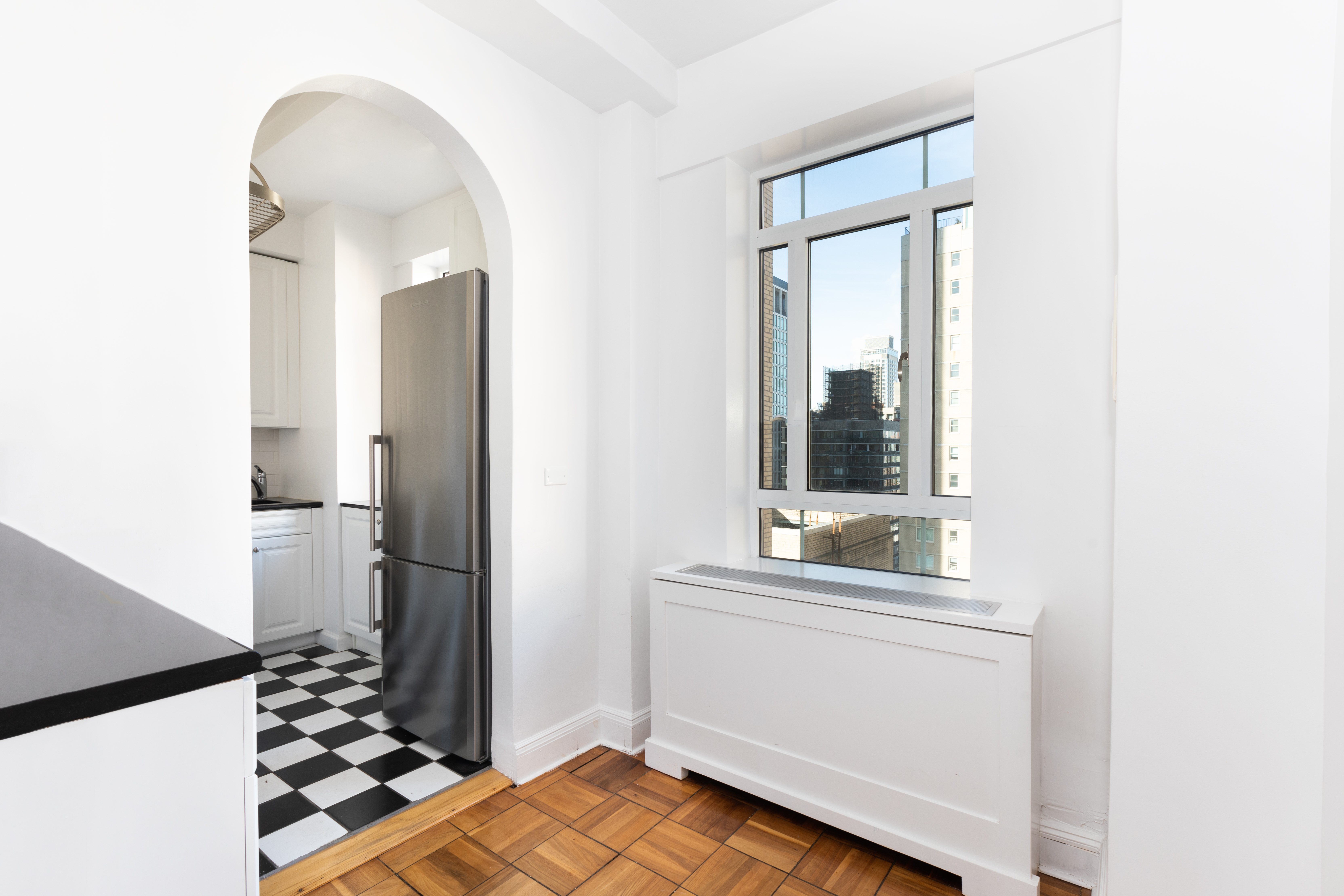25 Central Park West, Unit 25K Manhattan, NY 10023 - Photo 8 of 14 a bathroom with a sink and a mirror
