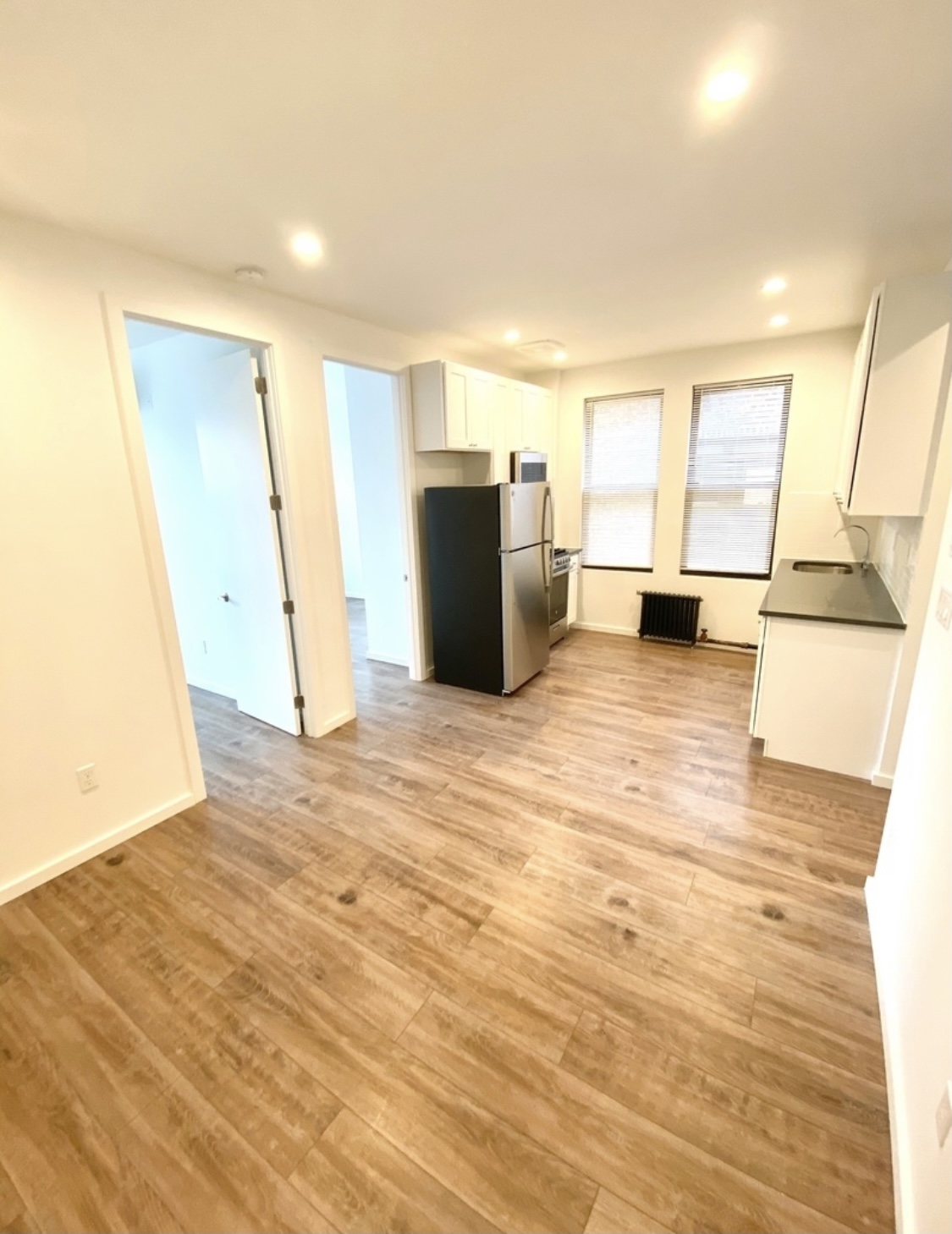 31-14 36th Street, Unit 3F Queens, NY 11106 - Photo 2 of 11 a view of a kitchen with a sink
