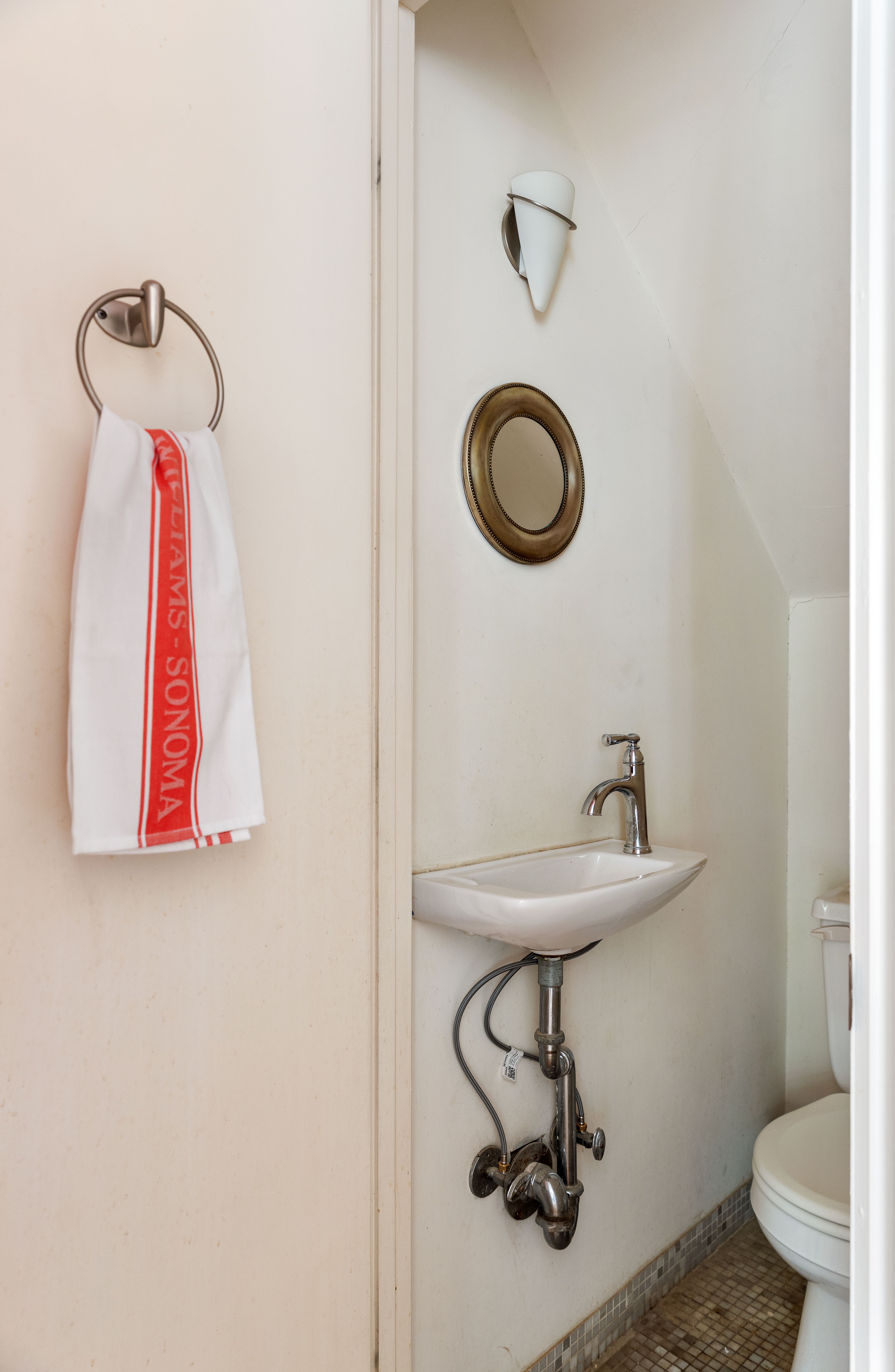 152 Dekalb Avenue Brooklyn, NY 11217 - Photo 15 of 27 a bathroom with a sink and a mirror