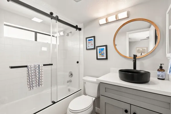 a view of a house with backyard of area and lake view