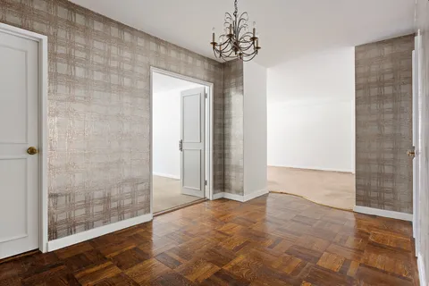 a view of a bathroom with a shower and a sink