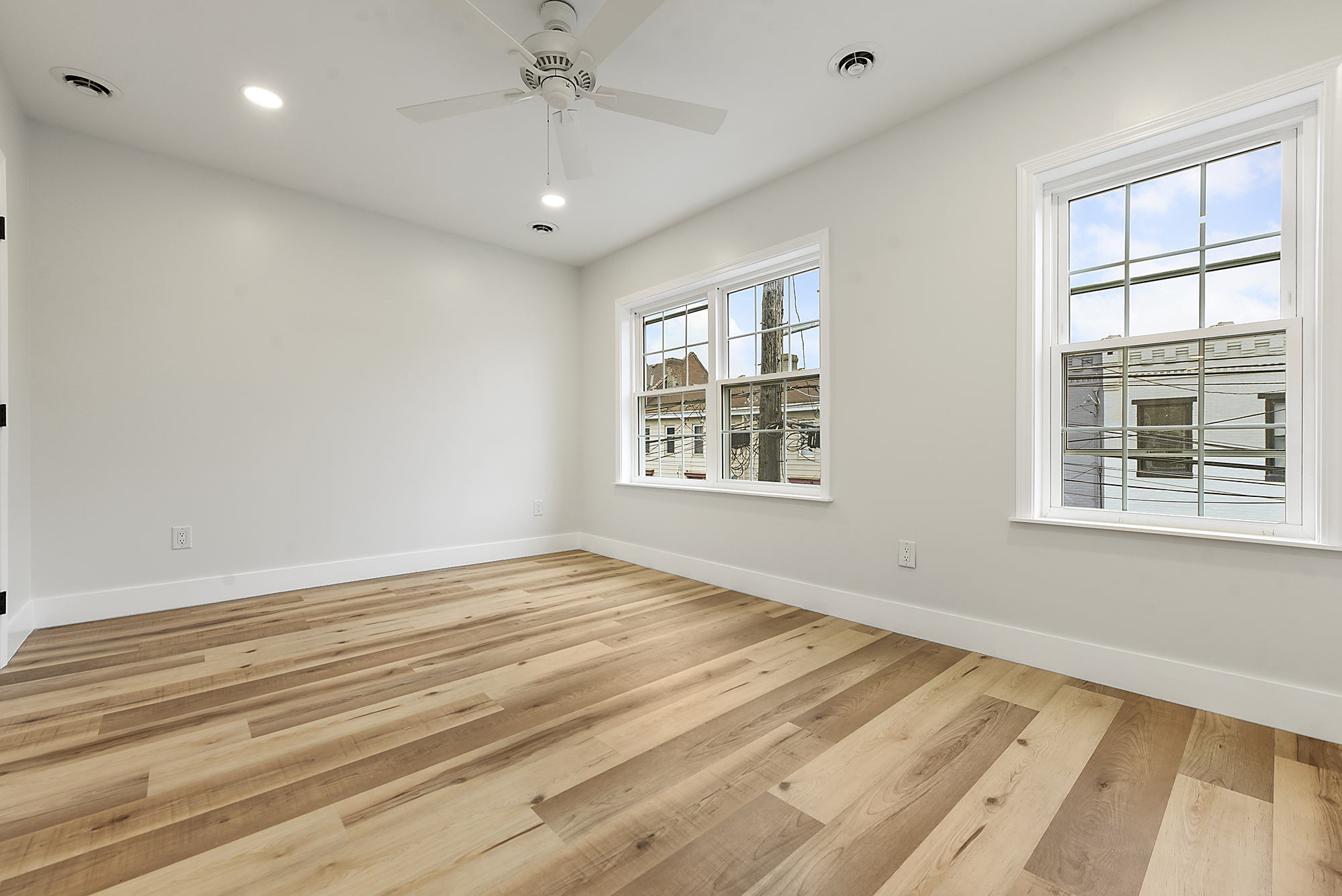 5412 Carnegie Street Pittsburgh, PA 15201 - Photo 26 of 55 a view of empty room with wooden floor and fan