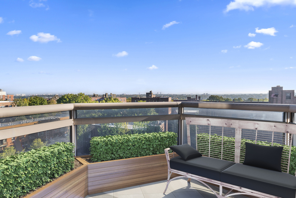 112-01 Queens Boulevard, Unit 8B Queens, NY 11375 - Photo 6 of 16 a view of a roof deck with couches and wooden floor
