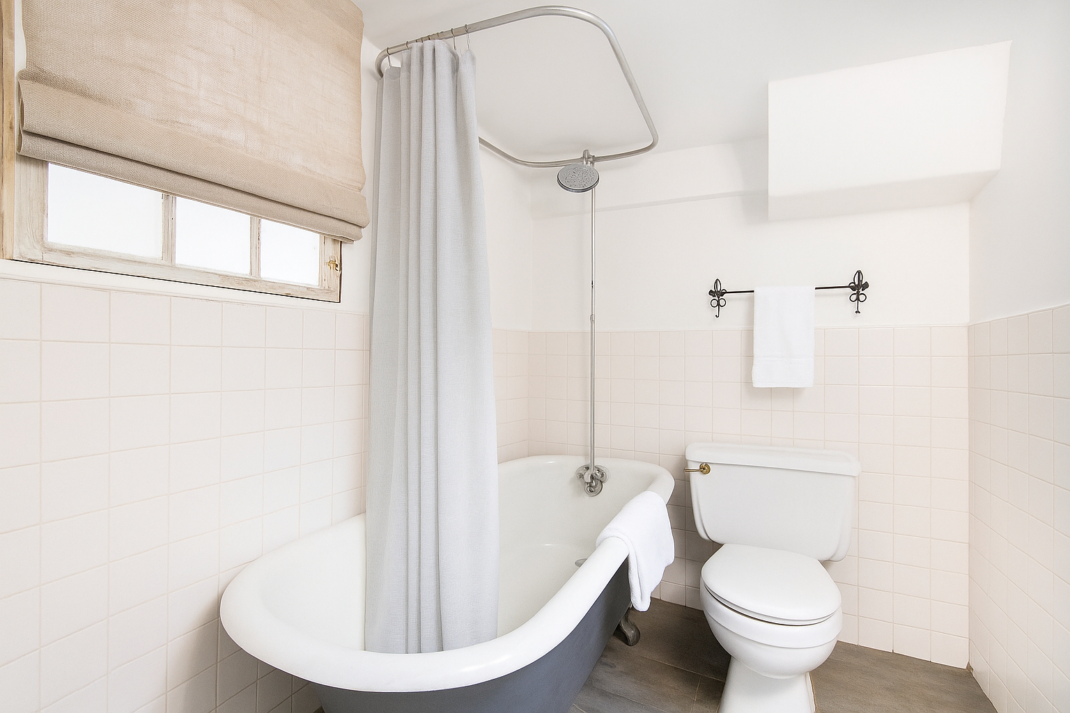 113 1/2 West 15th Street, Unit 1W Manhattan, NY 10011 - Photo 6 of 12 a bathroom with a toilet and a shower