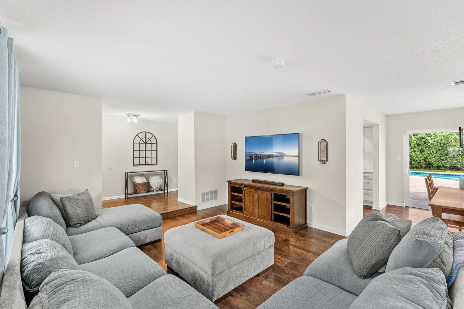 a living room with furniture and a table
