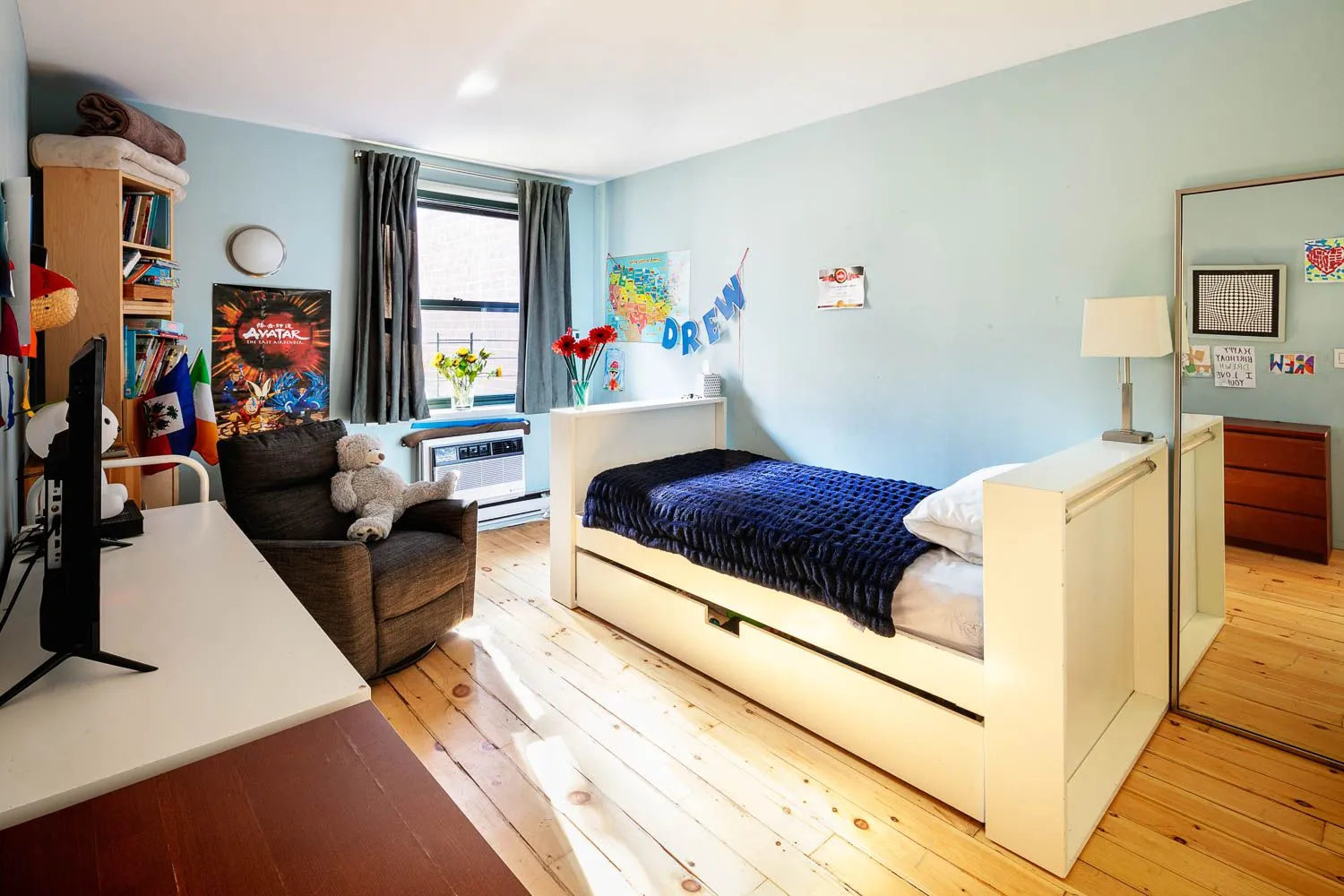 a living room with furniture and a window